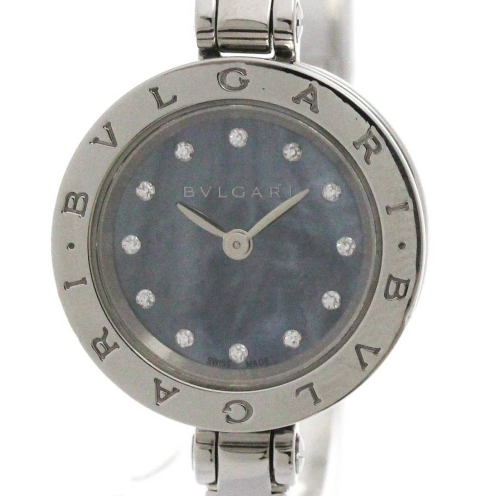 Bvlgari Wristwatch: Bvlgari Wristwatch Stainless steel case and band add a touch of sophistication to this Bvlgari wristwatch, featuring a blue shell dial that exudes elegance. The watch boasts a classic dress/formal sty