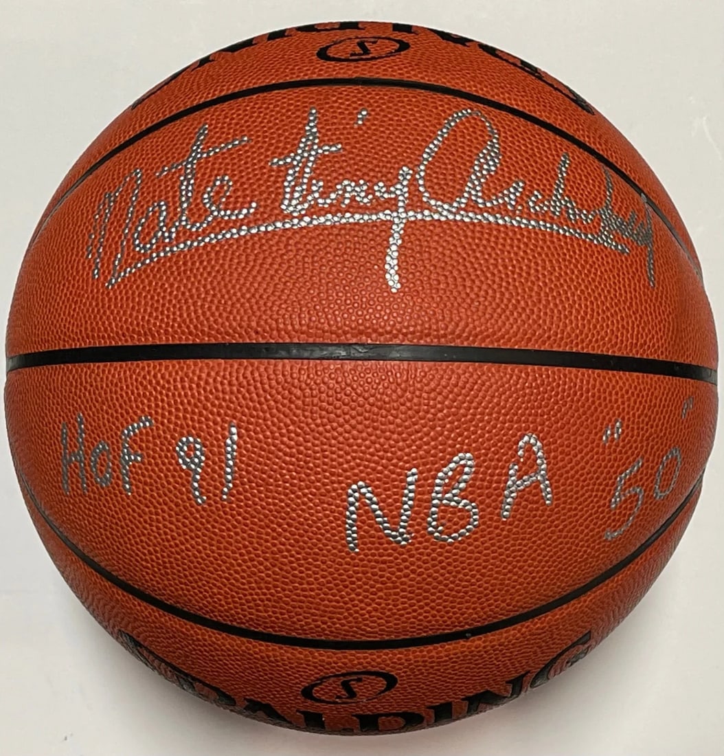 Nate Archibald Autographed Spalding Leather Basketball: Nate Archibald Autographed Spalding Leather Basketball Nate Archibald's signature in silver paint pen adds a touch of authenticity to this Spalding Leather Basketball, which also features an