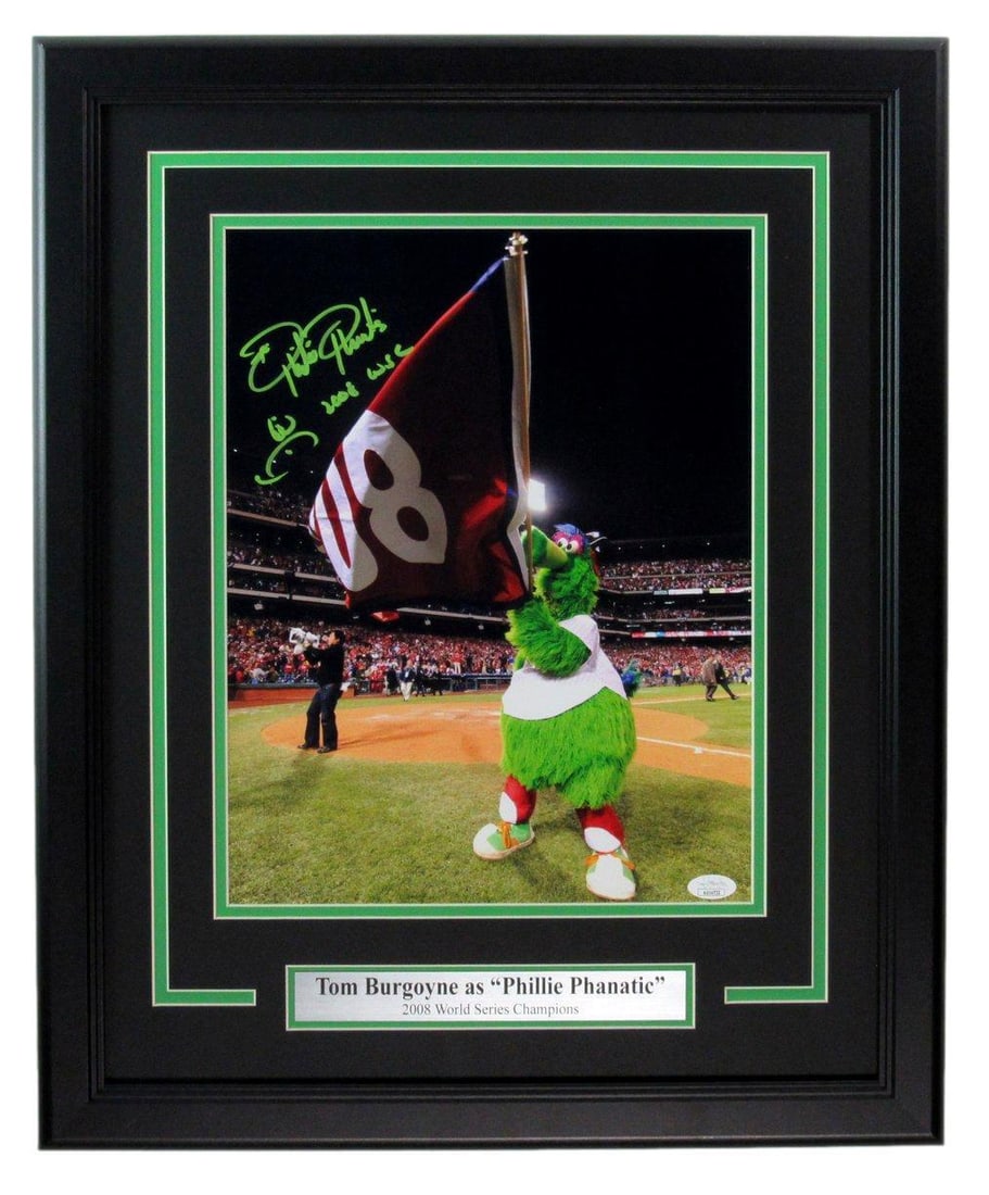 Signed Phillie Phanatic Tom Burgoyne 11x14 Photo Framed by JSA: Signed Phillie Phanatic Tom Burgoyne 11x14 Photo Framed by JSA Signed by Phillie Phanatic Tom Burgoyne, this 11x14 photo bears the iconic mascot's signature. Framed by JSA, a reputable sports