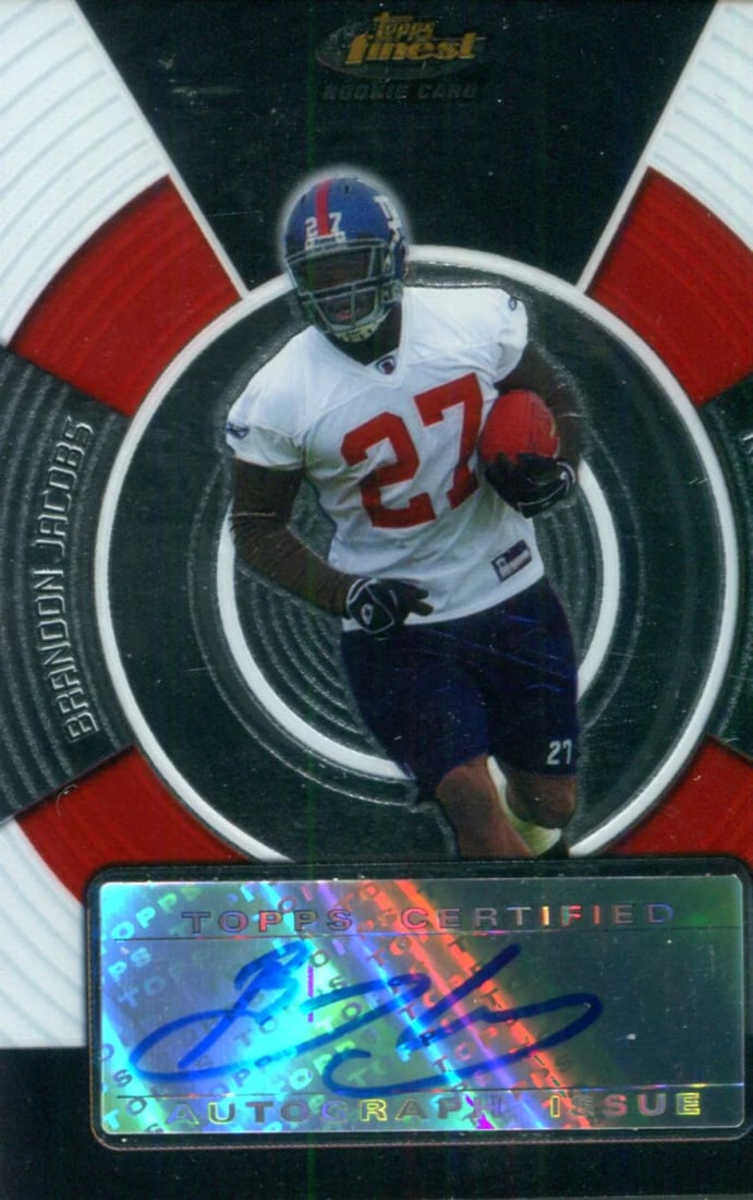 Topps Autographed Card by Brandon Jacobs: Topps Autographed Card by Brandon Jacobs Topps Autographed Card by Brandon Jacobs bears the signature of the former NFL running back. This card features high-quality printing and a glossy finish, maki
