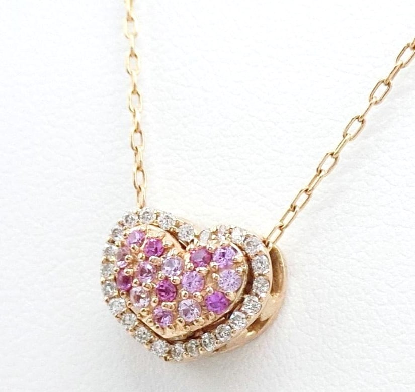 Ponte Vecchio Pink Sapphire Diamond Heart 18k Rose Gold Necklace Customizable: Ponte Vecchio Pink Sapphire Diamond Heart 18k Rose Gold Necklace Customizable 18k Rose Gold necklace featuring a heart-shaped pendant with a round pink sapphire and diamond charm, suspended from a