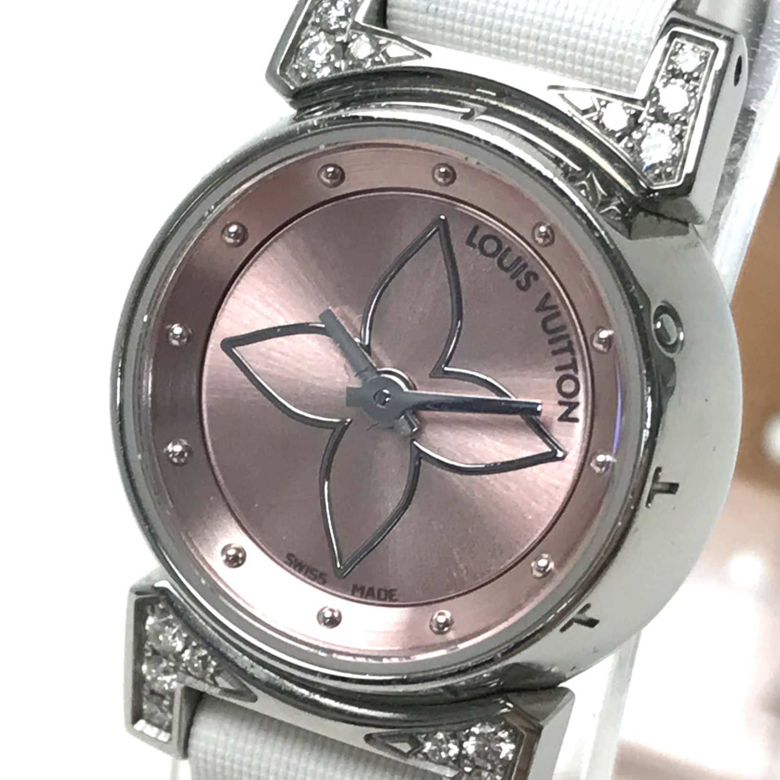 Louis Vuitton Wristwatch Other: Louis Vuitton Wristwatch Other Used Louis Vuitton pink wristwatch with a band length of 6.5inch / 16.5cm and a band width of 3.1inch / 8mm, bearing some traces of usage and minor scratches/dirt. The