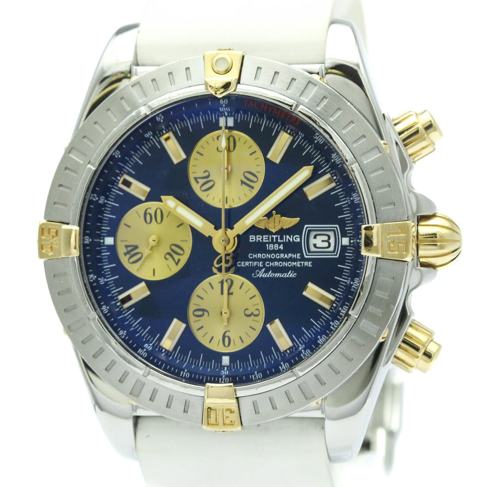 Breitling Wristwatch: Breitling Wristwatch Stainless Steel and Yellow Gold 18K case, a durable and luxurious combination. The sporty design features a blue dial and a rubber band, perfect for everyday wear. With its 44mm d