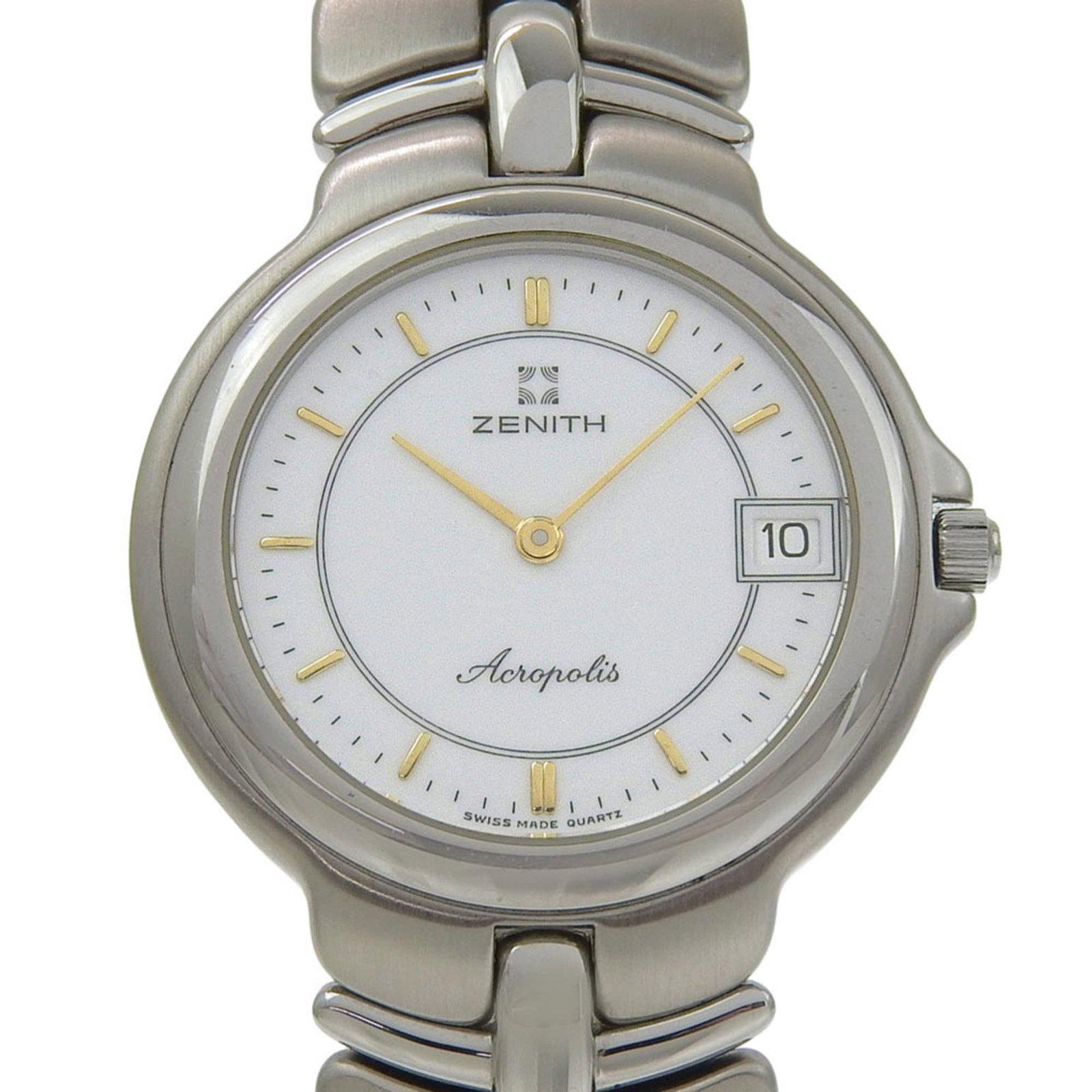 Wristwatch at Zenith: Wristwatch at Zenith Stainless steel case and band provide a sleek, durable finish for the Zenith wristwatch. The white dial stands out against the metal backdrop, adding a touch of contrast to the