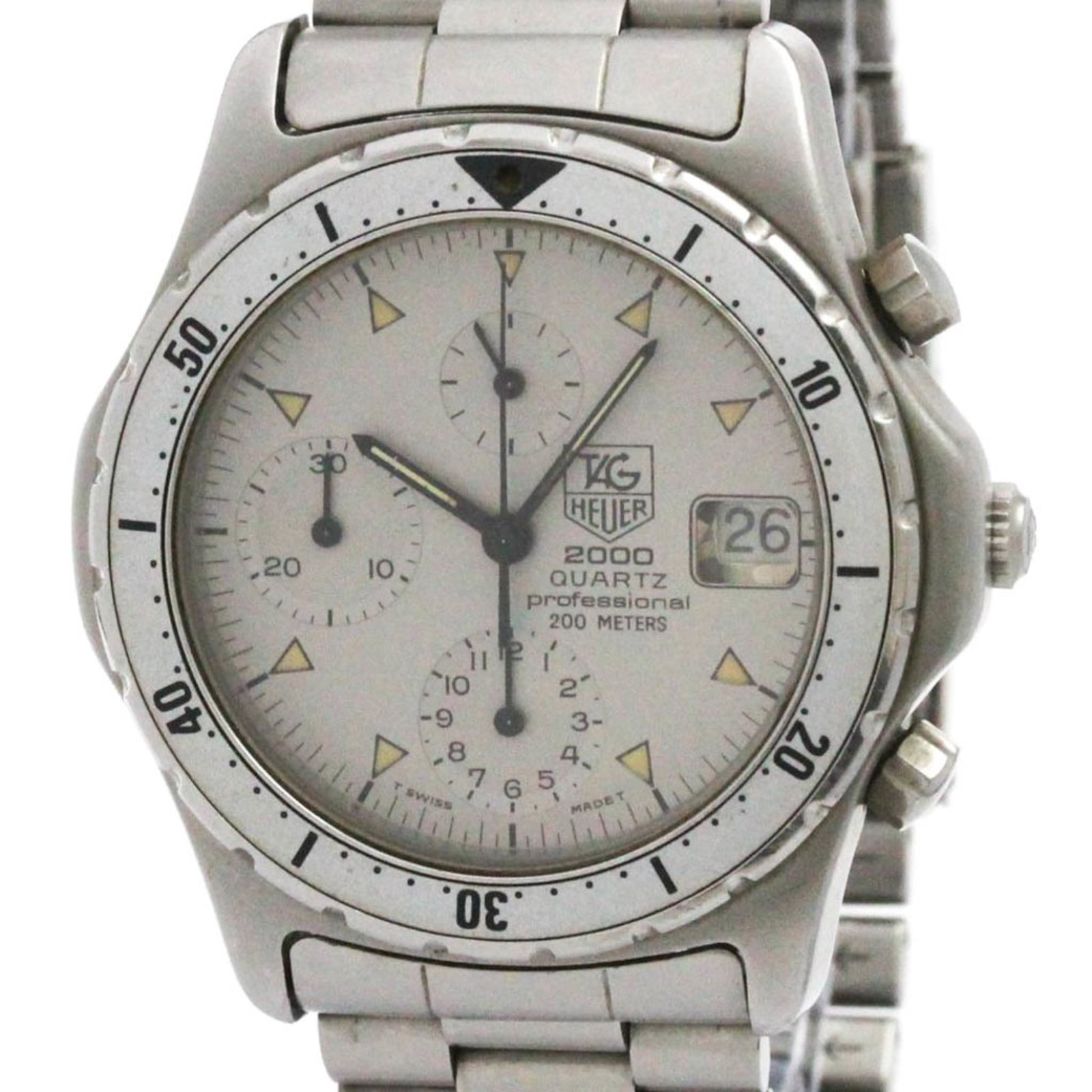 Wristwatch by Tag Heuer: Wristwatch by Tag Heuer Stainless steel case and band provide durability, while the silver dial adds a touch of sophistication to this sporty timepiece. The 40mm diameter ensures a comfortable fit for
