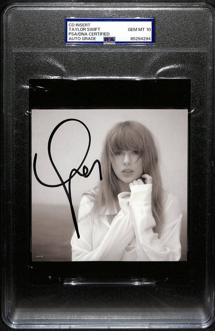 Taylor Swift Signed/ Auto CD Insert 4.75x4.75 B/ W Photo PSA/ DNA GEM MT 10 190865: Taylor Swift Signed/ Auto CD Insert 4.75x4.75 B/ W Photo PSA/ DNA GEM MT 10 190865 Signed CD insert from Taylor Swift, featuring a black and white photo PSA. The item is graded MT 10, indicating near-