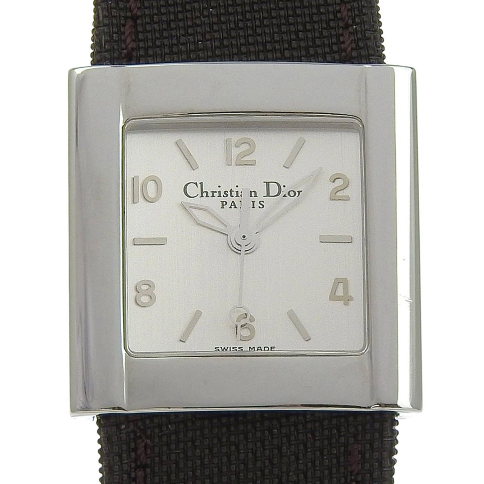 Christian Dior Wristwatch: Christian Dior Wristwatch Stainless steel case and canvas band make for a sleek, modern look. This Christian Dior wristwatch boasts an analog display in silver, perfect for everyday wear. With its cla