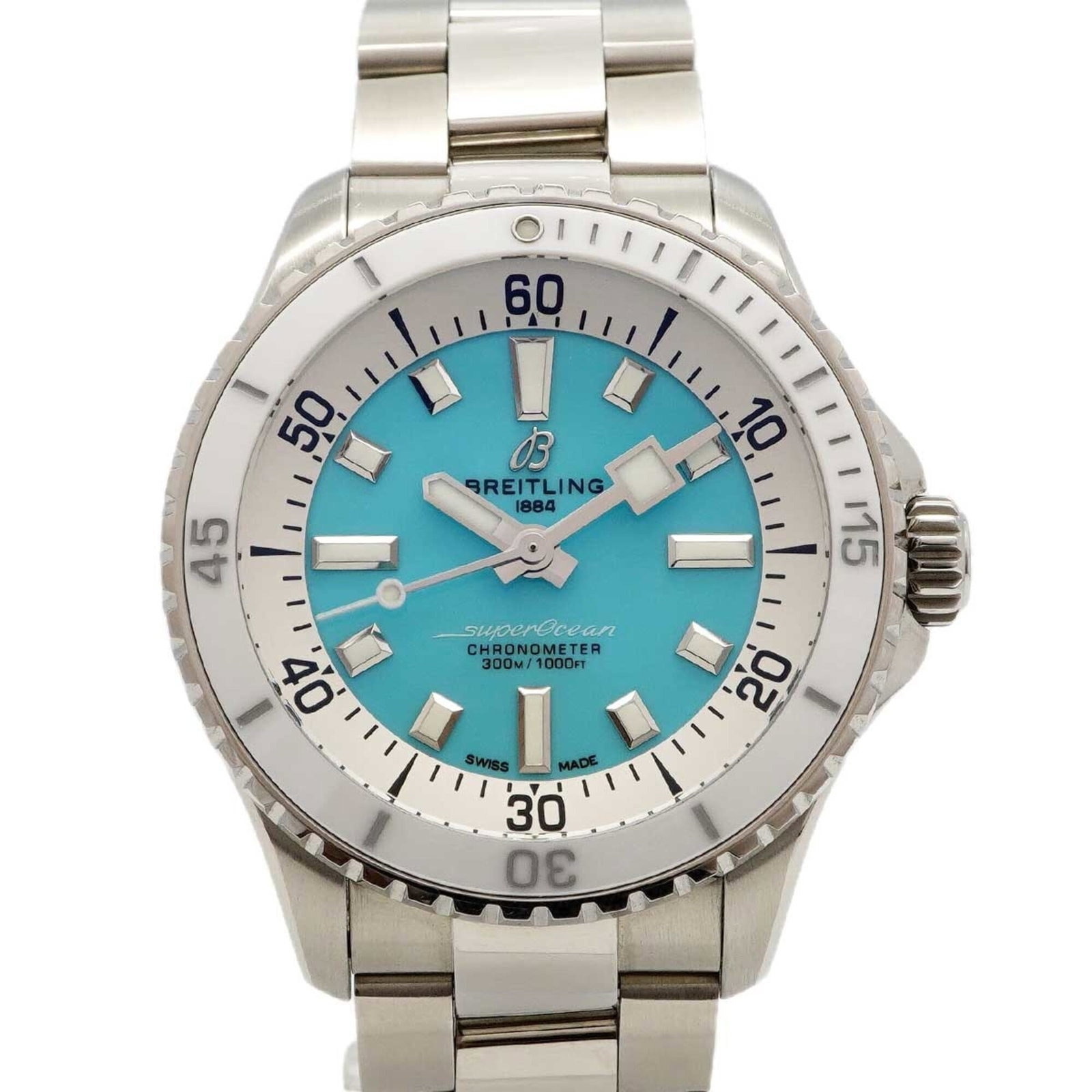 Breitling Wristwatch: Breitling Wristwatch Breitling wristwatch with a blue dial and stainless steel band, measuring 36mm in diameter. The watch has a worn appearance, showing traces of usage and minor scratches, but remai