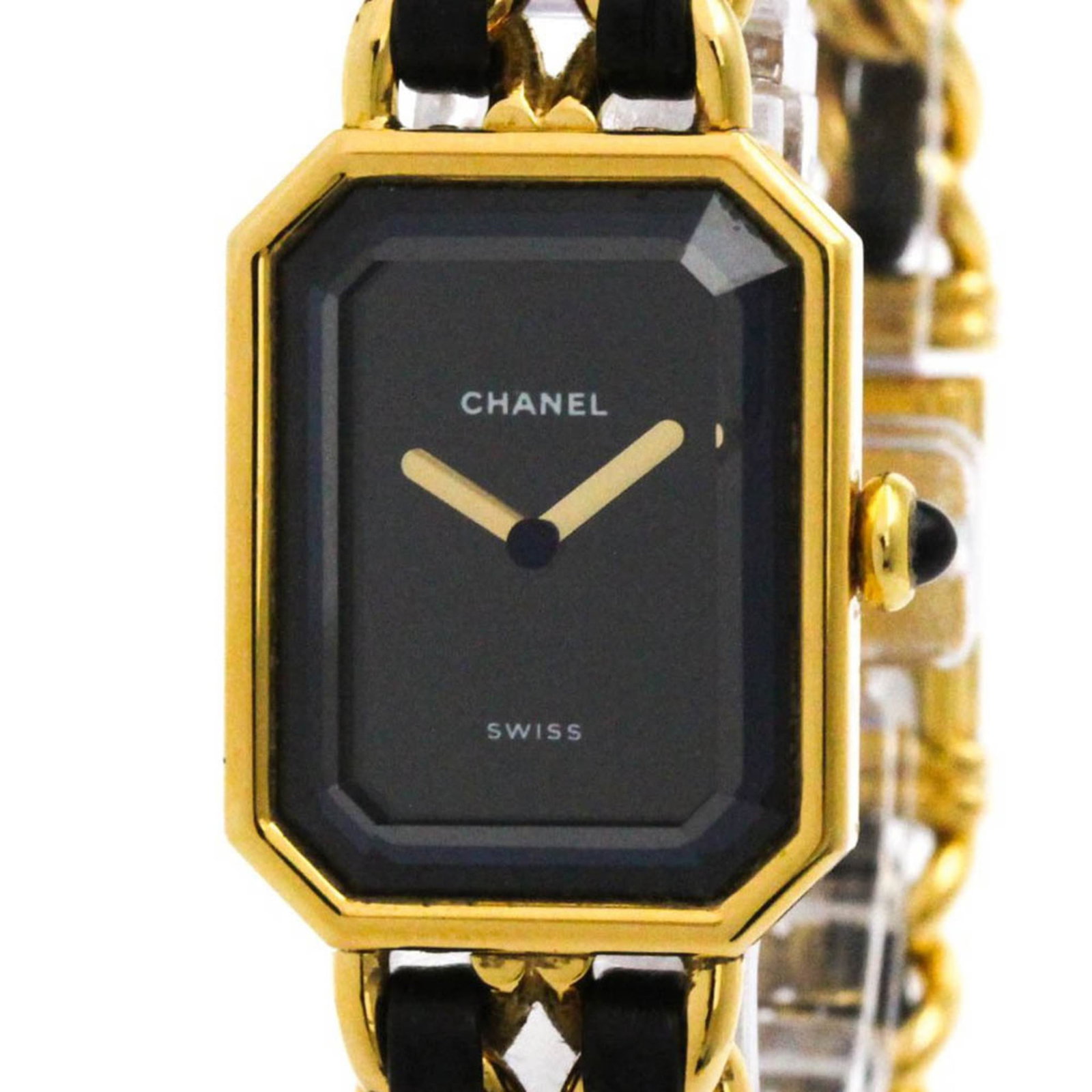 Wristwatch by Chanel: Wristwatch by Chanel Gold Plated Wristwatch by Chanel, featuring a black dial and gold plated case and band, is a stylish dress/formal timepiece. The watch has a diameter of 20mm and shows traces of u