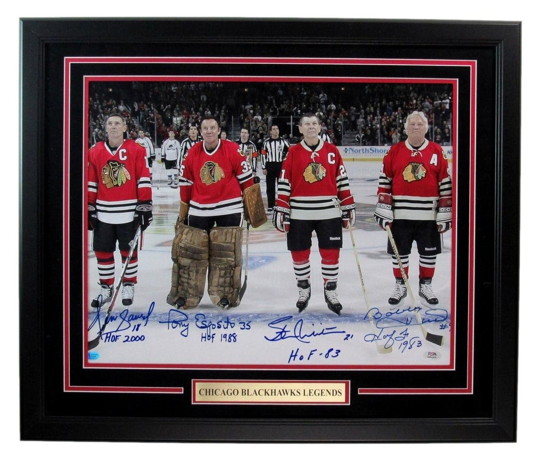 Blackhawks Framed PSA/ DNA Mikita Esposito Savard/ Hull 16x20 Multi-Signed Photo: Blackhawks Framed PSA/ DNA Mikita Esposito Savard/ Hull 16x20 Multi-Signed Photo This 16x20 multi-signed photo features PSA/DNA authentication and is framed, showcasing the signatures of Blackhawks pl