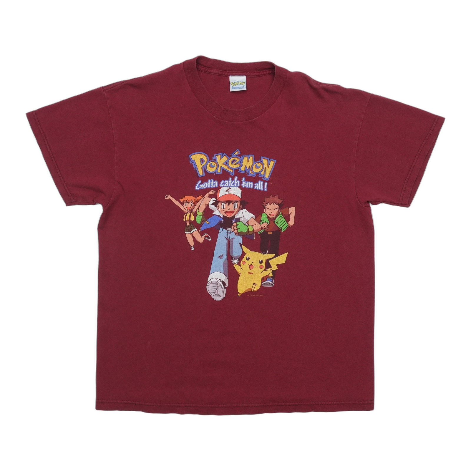 1999 Pokemon Gotta Catch Em All Shirt: 1999 Pokemon Gotta Catch Em All Shirt This vintage 1999 Pok?mon Gotta Catch Em All Shirt is a true retro find, featuring a bold red front graphic. Made from 100% cotton, the shirt measures approximate