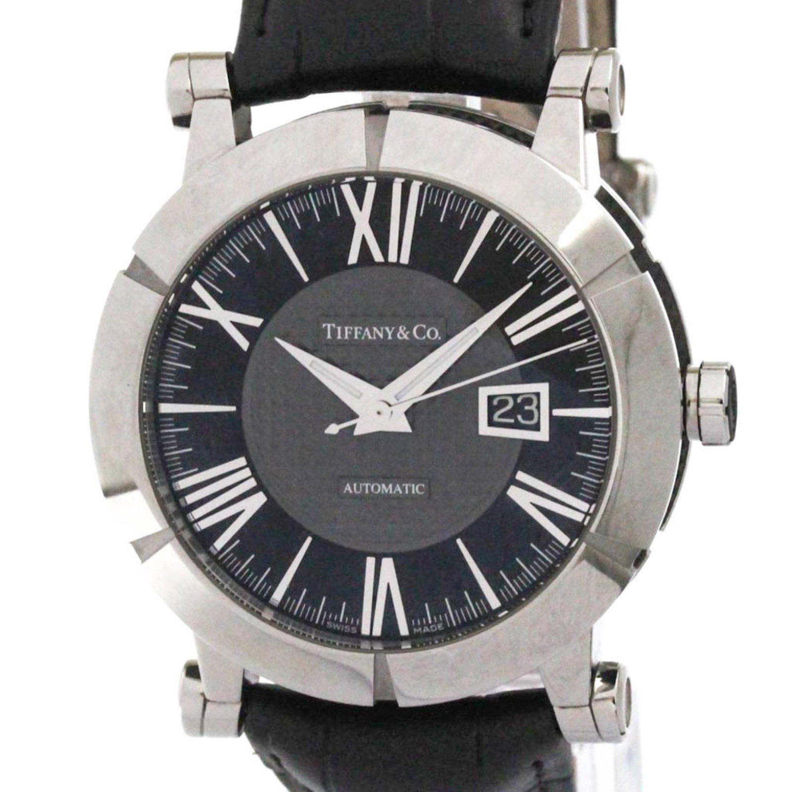 Wristwatch Tiffany: Wristwatch Tiffany This Tiffany wristwatch boasts a sleek black dial and durable stainless steel case, paired with a supple leather band for a sophisticated look. Its rubber and stainless steel