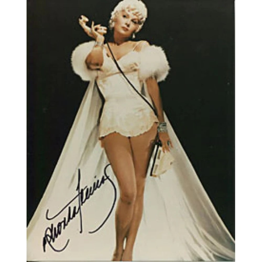 Rhonda Fleming Autographed Photo 8X10: Rhonda Fleming Autographed Photo 8X10 Rhonda Fleming's signature adds a touch of Hollywood glamour to this 8x10 photo, capturing her timeless beauty. The high-quality print showcases her striking feat