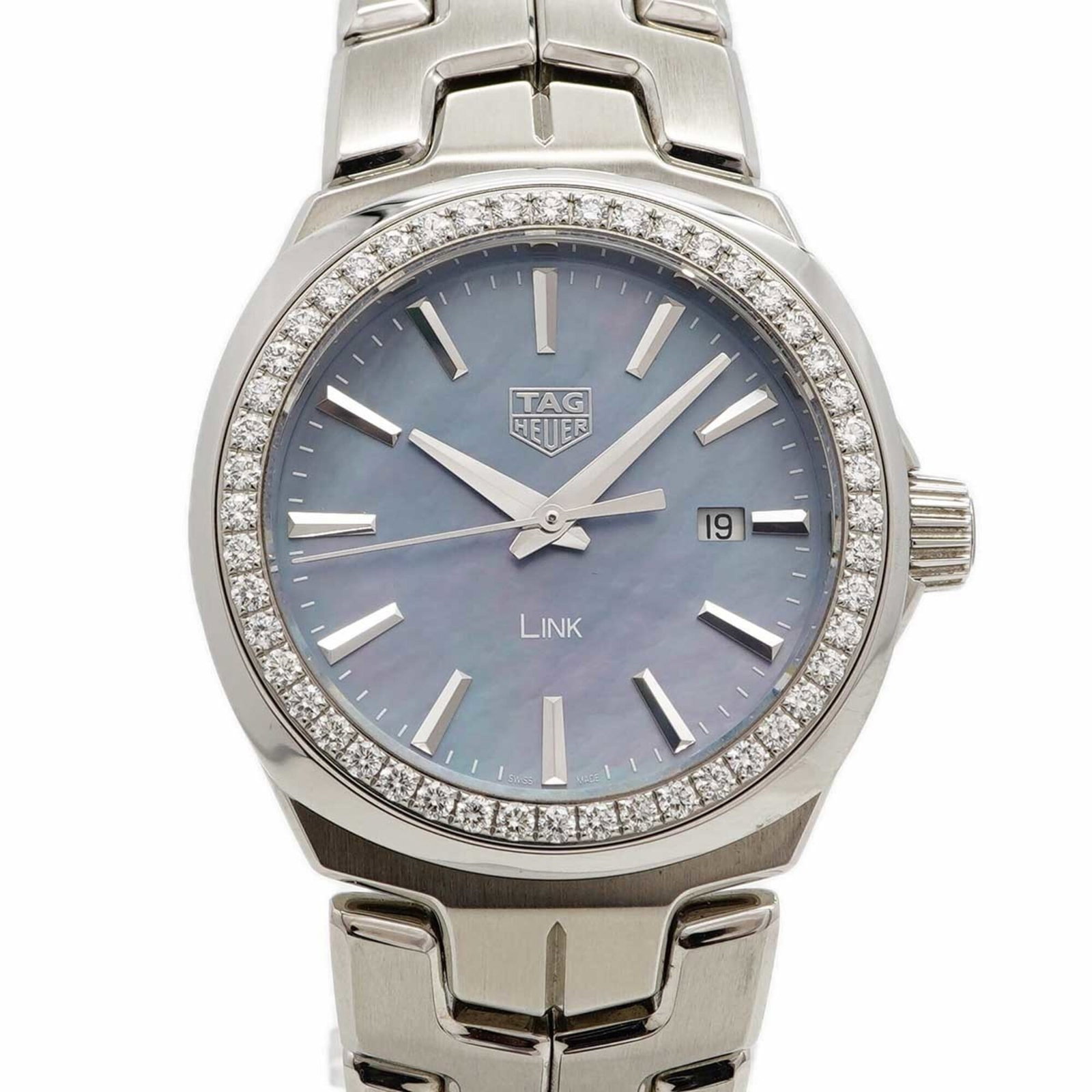 Wristwatch by Tag Heuer: Wristwatch by Tag Heuer Stainless steel band adds a touch of sophistication to this blue-dialed watch, available in a compact 32mm case diameter. The watch features a classic design with a few traces 