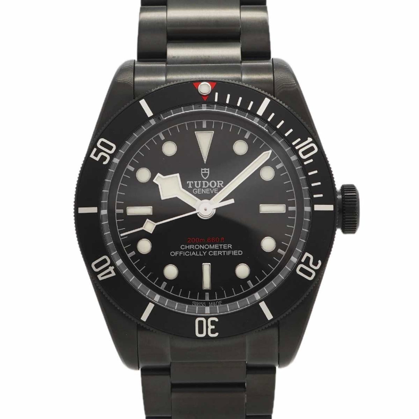 Tudor Wristwatch: Tudor Wristwatch Stainless steel band and black dial make up the Tudor wristwatch, measuring 41.1mm in diameter. The watch has a few traces of usage, with some scratches and dirt visible, but remains 