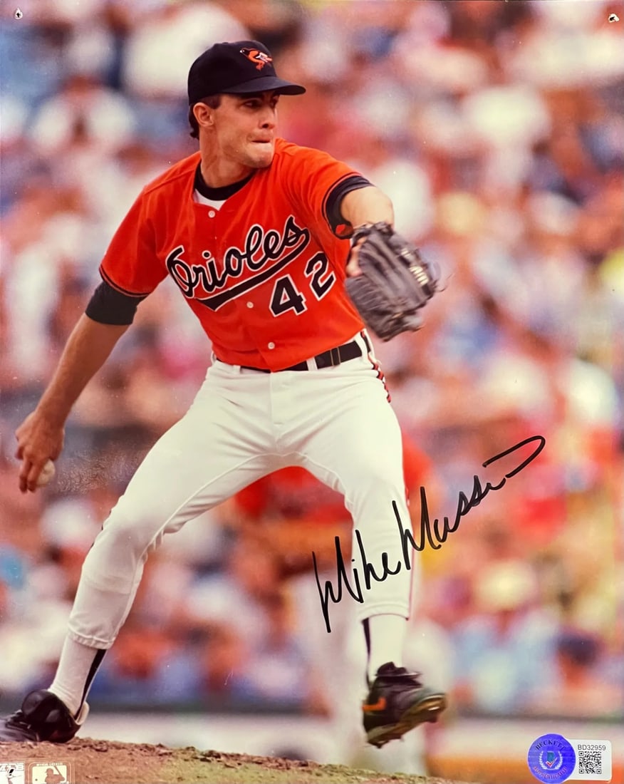 Autographed 8x10 Baseball Photo by Mike Mussina: Autographed 8x10 Baseball Photo by Mike Mussina Mike Mussina's sharpie signature adds a touch of authenticity to this 8x10 baseball photo, making it a unique piece for collectors. The photo itself is 