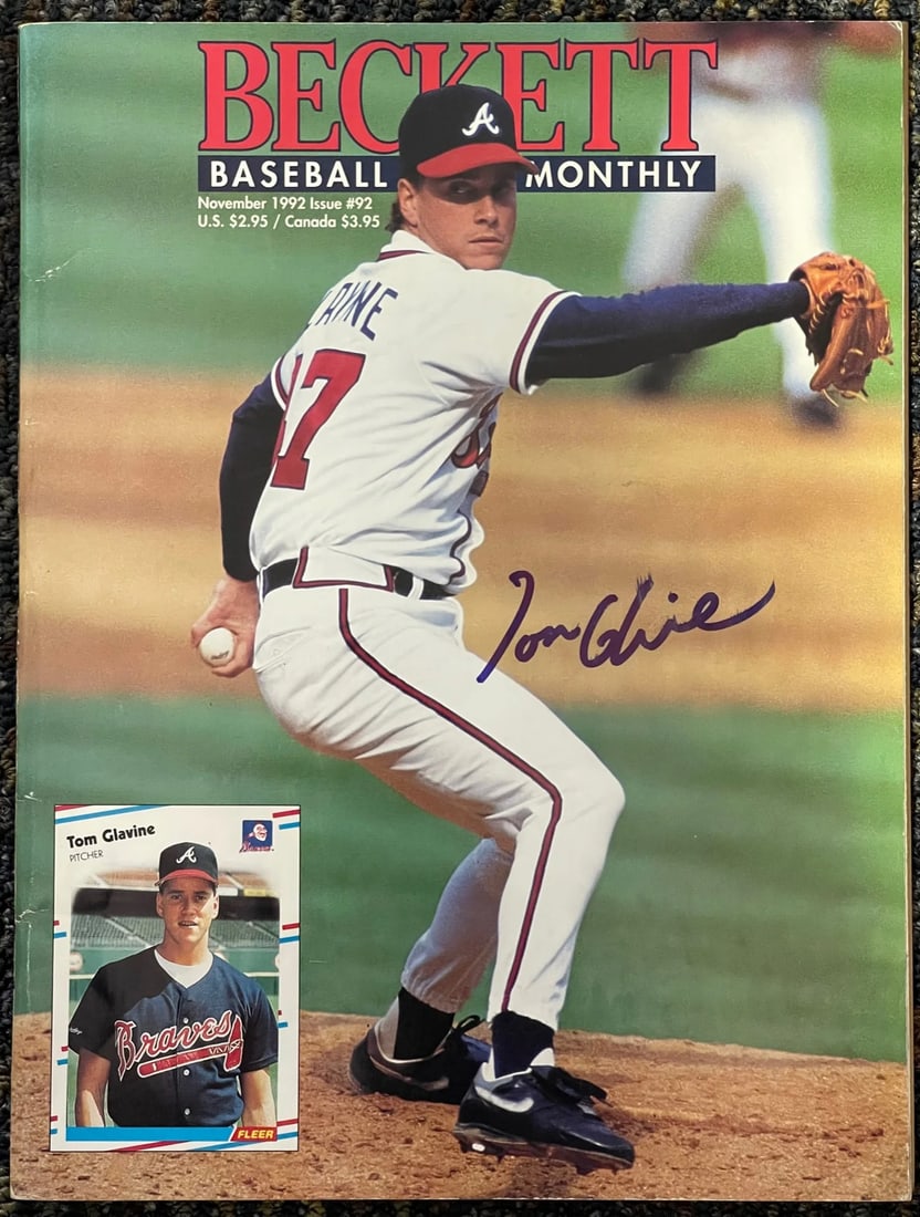 Tom Glavine Autographed Beckett Magazine November 1992: Tom Glavine Autographed Beckett Magazine November 1992 Tom Glavine's blue sharpie signature across the front of the November 1992 Beckett Magazine adds a unique touch to this piece. The magazine, date