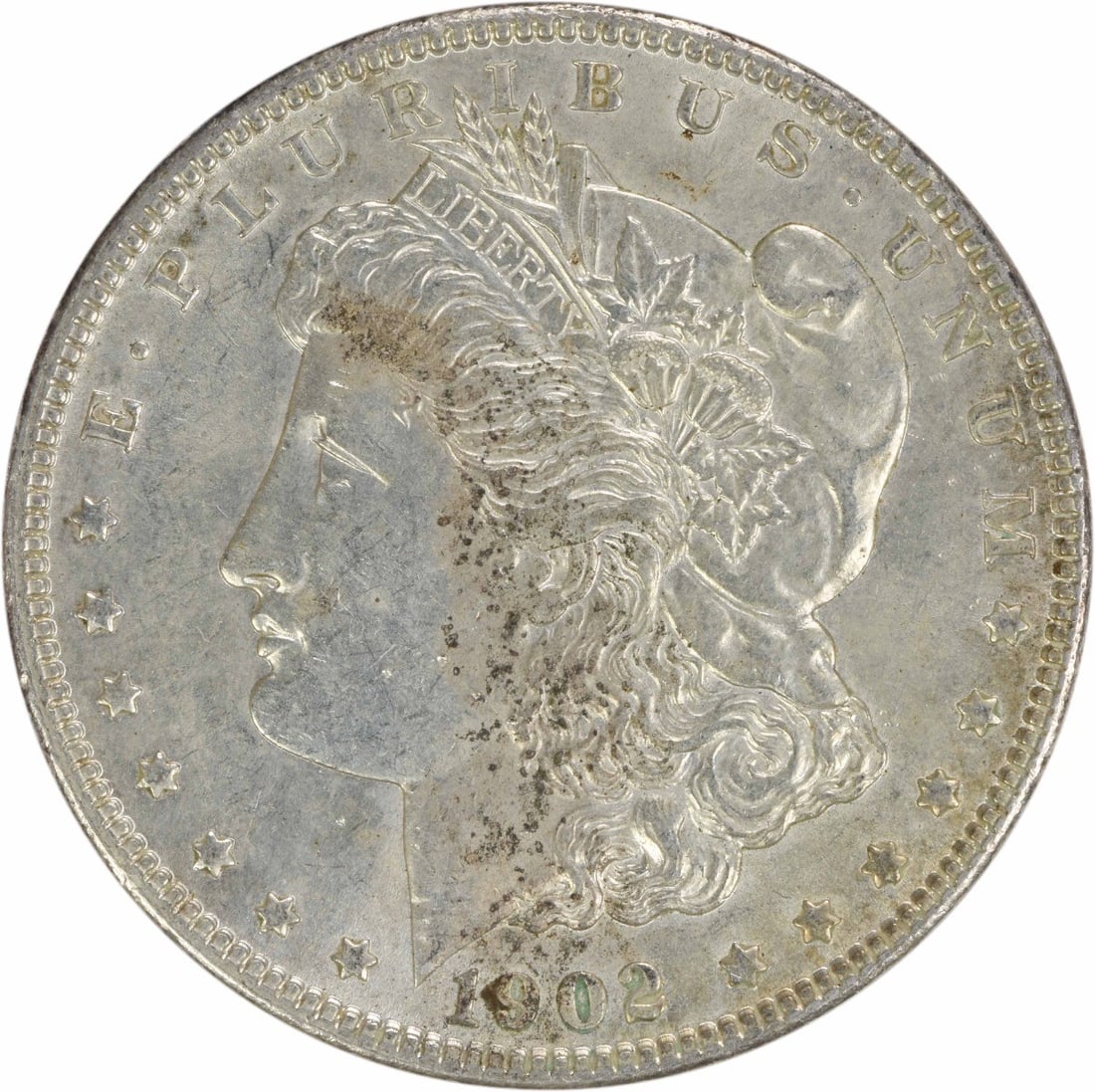 Uncertified Slider AU Dollar Silver Morgan 1902: Uncertified Slider AU Dollar Silver Morgan 1902 The 1902 Morgan dollar features George T. Morgan's iconic design, with its reeded edge and 90% silver composition making it a notable piece from the Phi