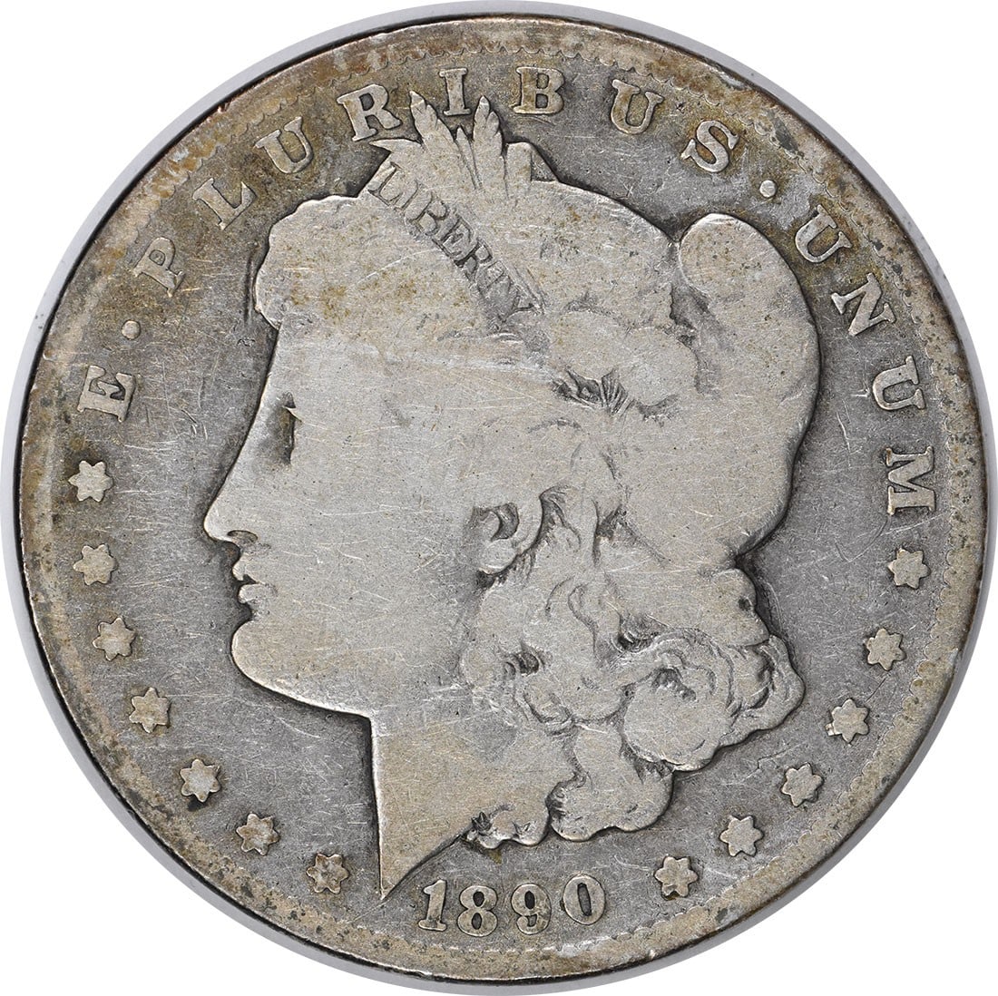 Uncertified 1890 CC Morgan Silver Dollar G: Uncertified 1890 CC Morgan Silver Dollar G The 1890 CC Morgan Silver Dollar G features a striking design by George T. Morgan, with its reeded edge and 90% silver composition making it a unique piece a