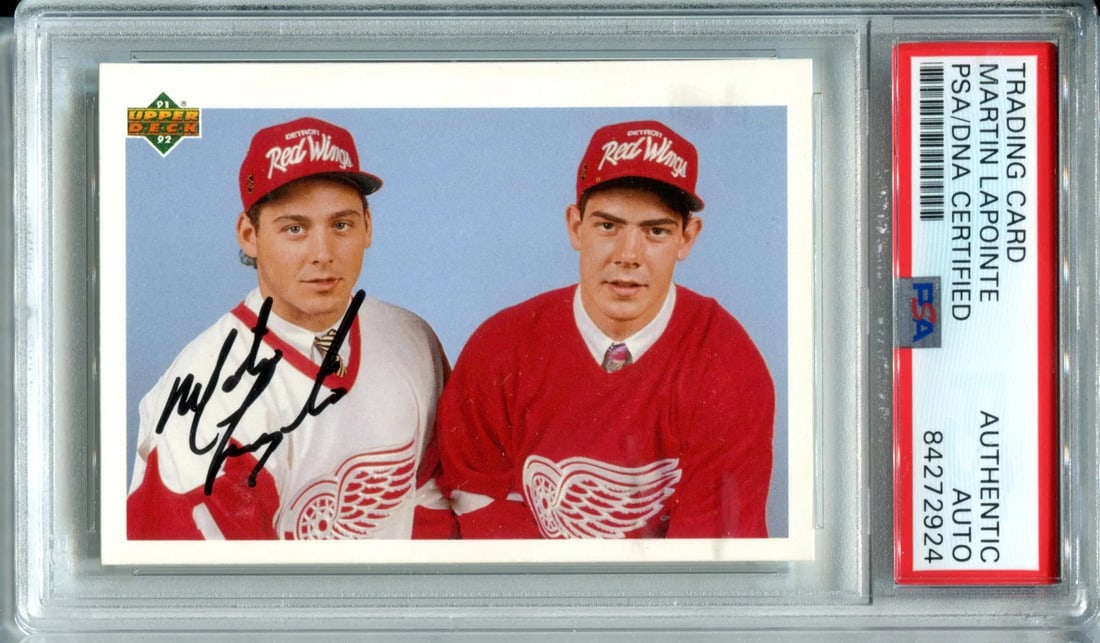 Martin Lapointe Autographed 1992 Upper Deck Card (PSA): Martin Lapointe Autographed 1992 Upper Deck Card (PSA) The Martin Lapointe Autographed 1992 Upper Deck Card features a sharpie signature across the front, bearing the mark of the hockey player. This c