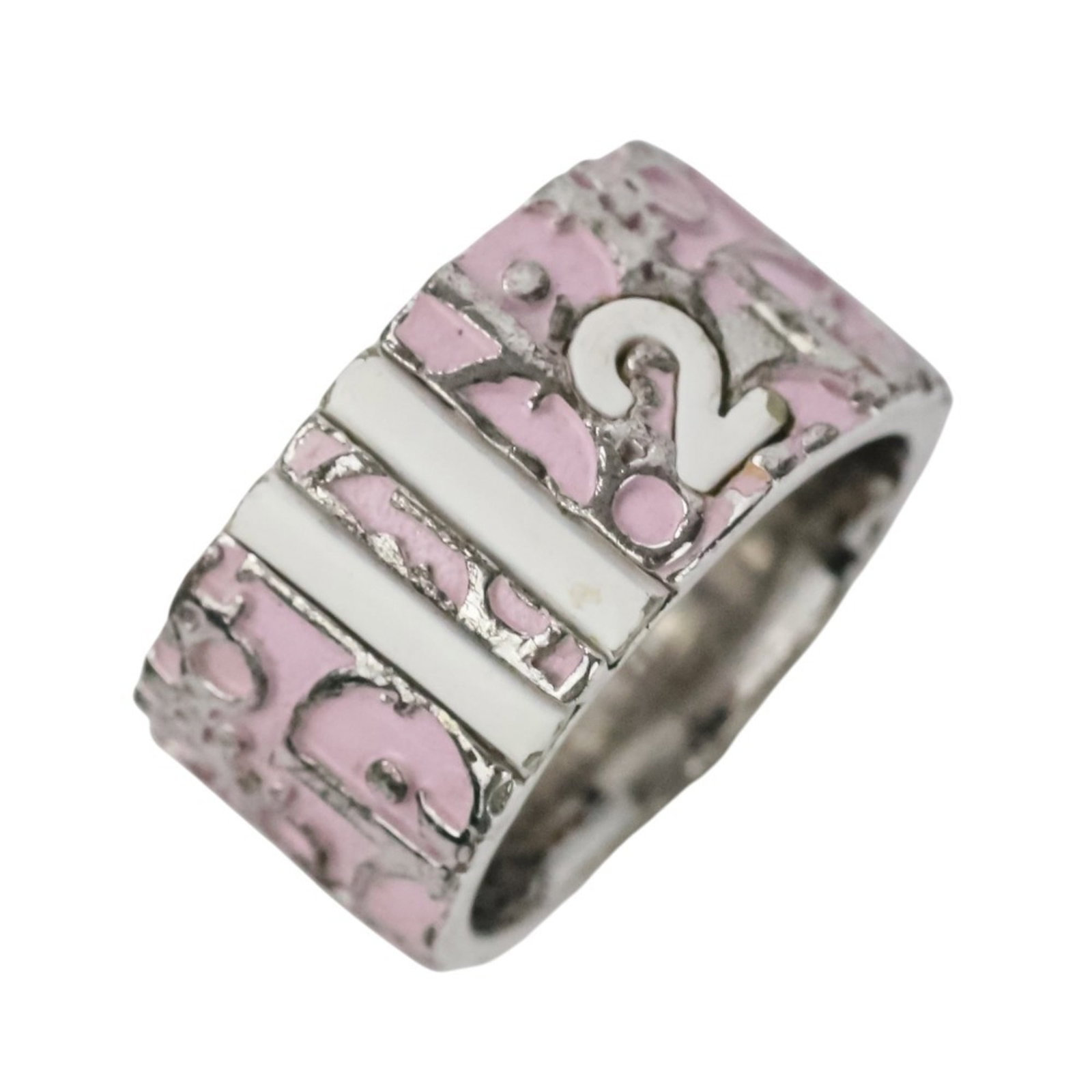 Christian Dior Ring: Christian Dior Ring Pink band ring from Christian Dior, featuring a subtle pink hue. The ring bears some minor scratches and dirt, but remains in very good condition overall. A few traces of usage