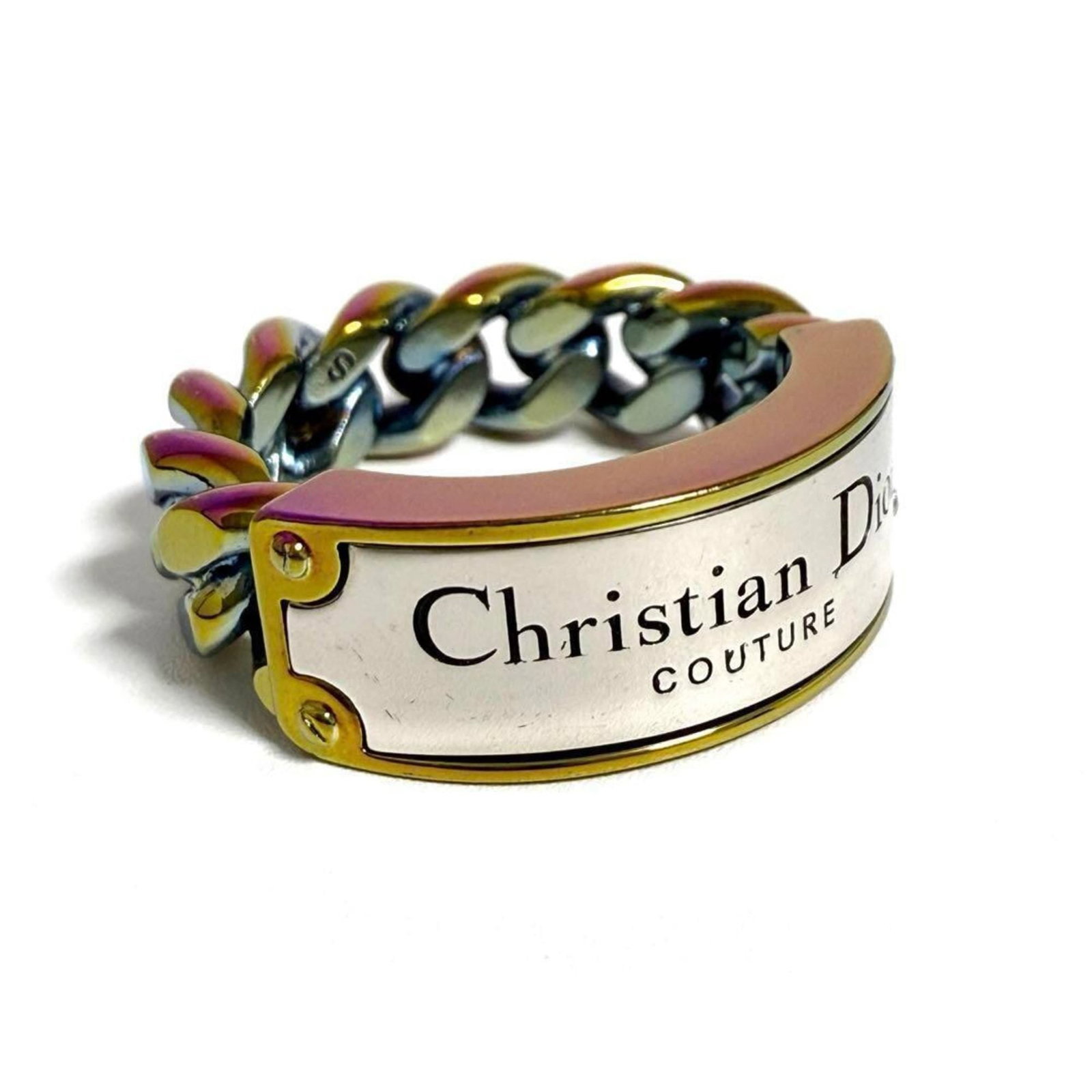 Dior Metal Ring Christian Band: Dior Metal Ring Christian Band This Dior Metal Ring features a multi-color design, showcasing the brand's signature style. Made from metal, it boasts a classic band shape that adds a touch of sophisti