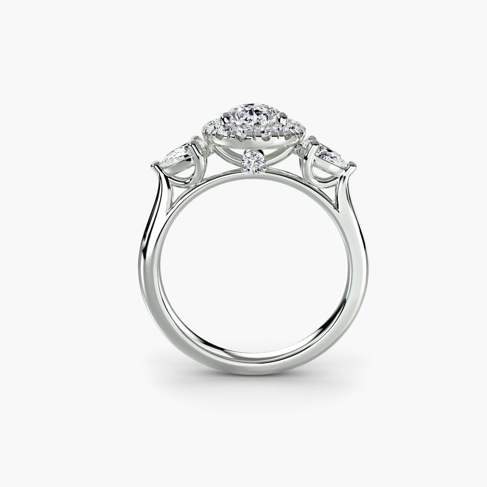 Halo Pear 14Kt White Gold Ring Setting: Halo Pear 14Kt White Gold Ring Setting Pear-shaped ring setting with 21 side stones totaling 0.517 carats, crafted from 14Kt white gold and featuring a sleek, modern design. The ring's EF/VS