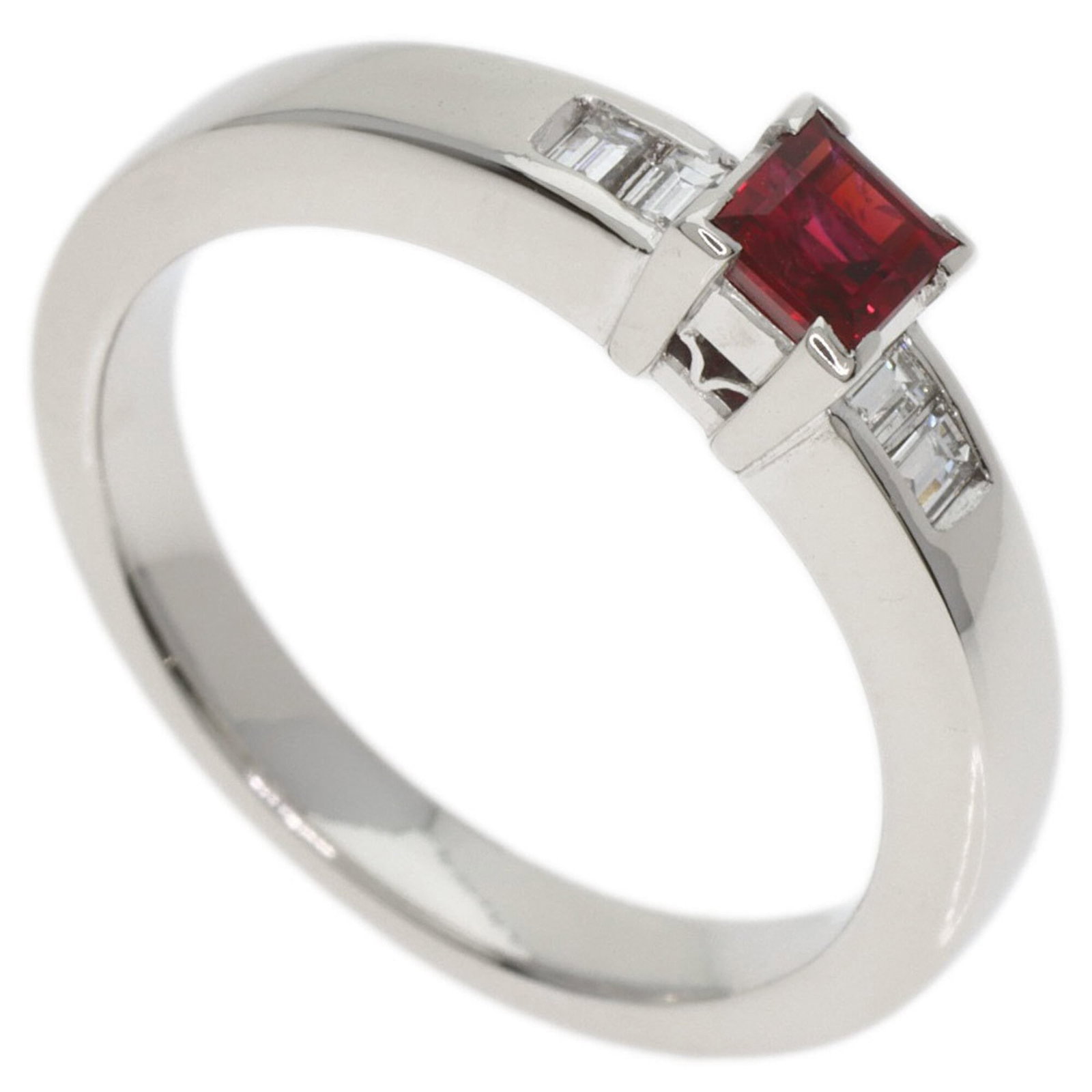 Christian Dior Band Ring Platinum 950: Christian Dior Band Ring Platinum 950 Platinum 950 band ring from Christian Dior, featuring a 0.47ct garnet stone and 0.11ct diamond secondary stones, set in a high-quality platinum setting. This