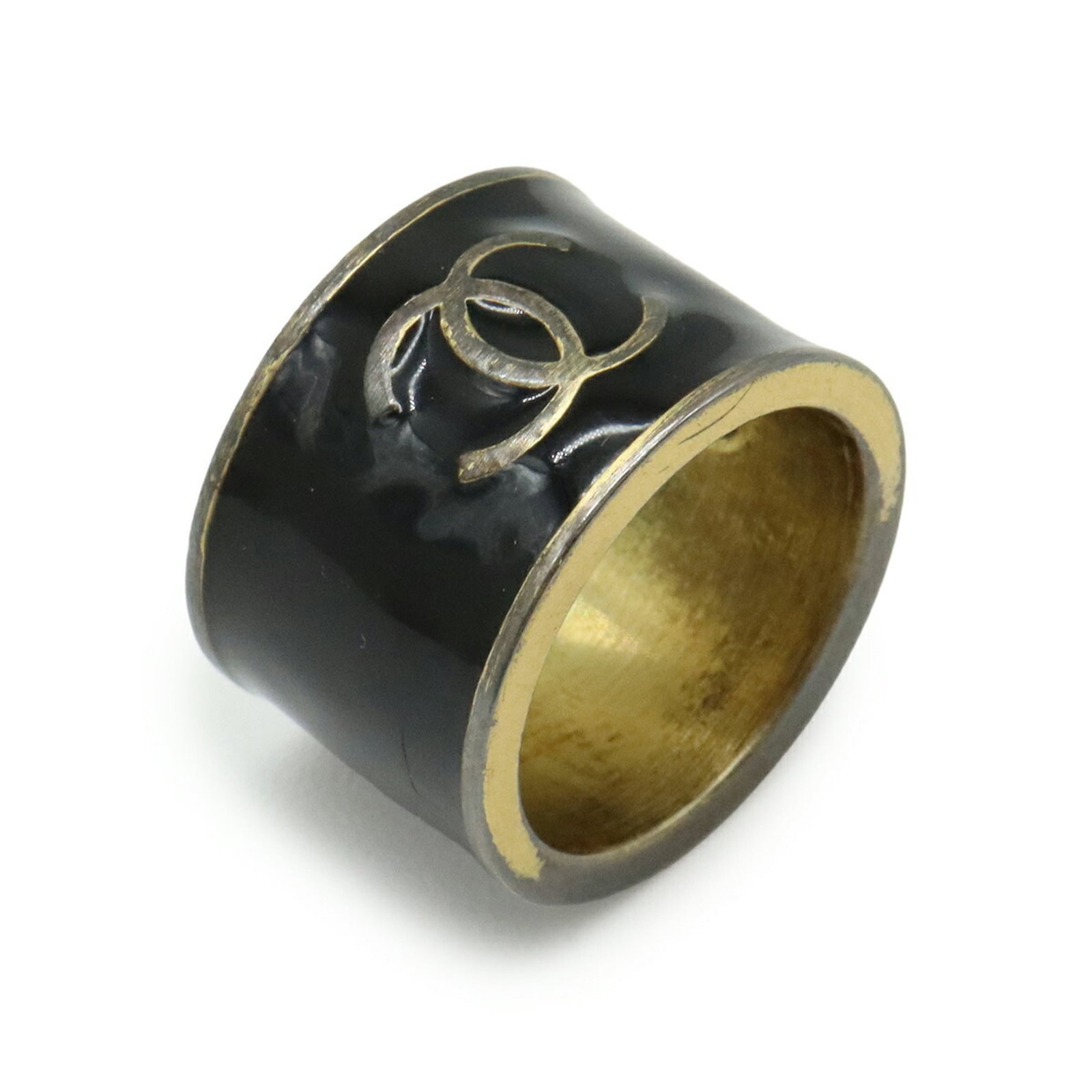 Metal Ring Chanel Band: Metal Ring Chanel Band Metal Ring Chanel Band - A Timeless Design with Character. This metal band ring features the iconic interlocking CC logo, showcasing the signature style of the renowned French