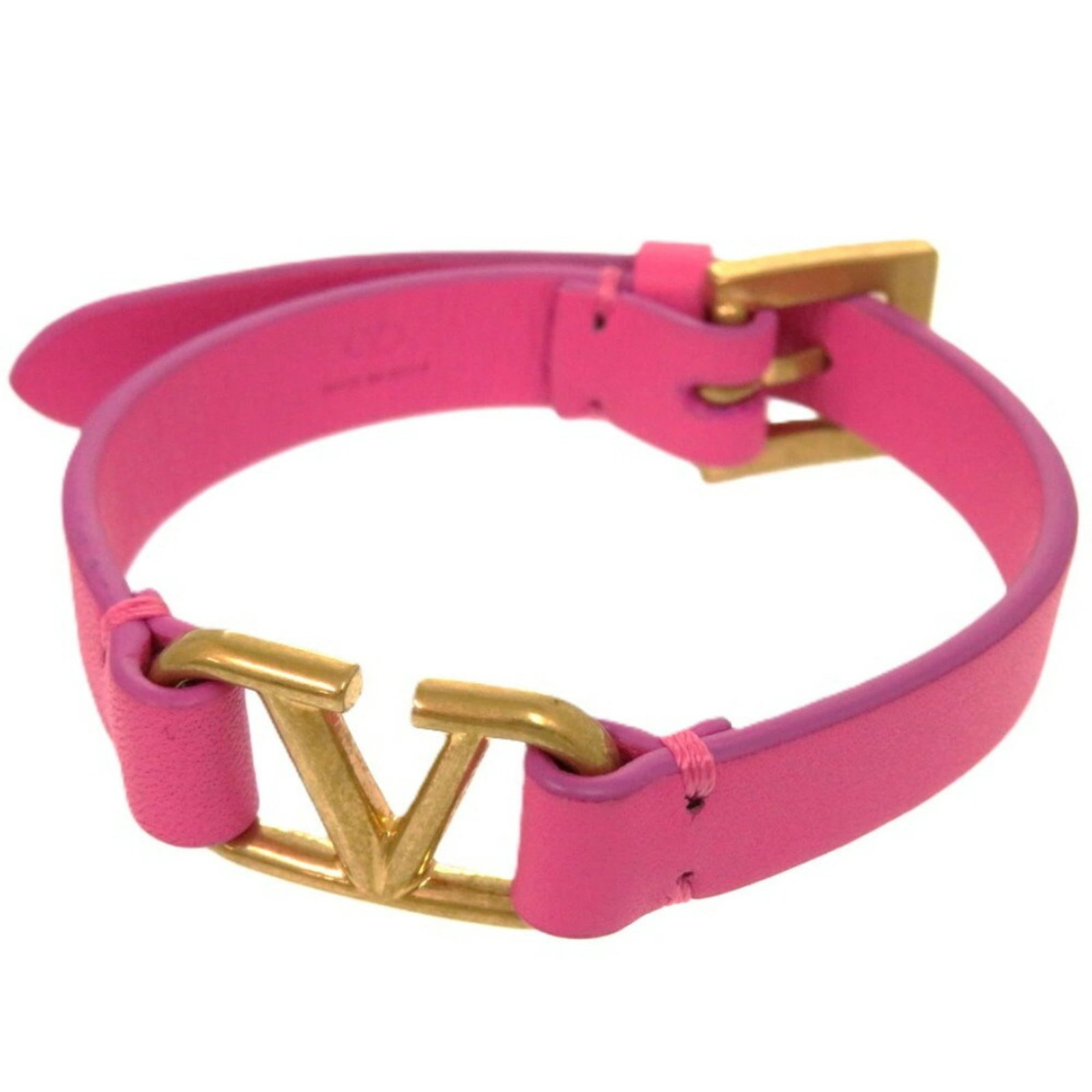 Garavani Charm Leather Valentino: Garavani Charm Leather Valentino Pink leather Charm bracelet from Valentino Garavani, measuring 23cm in length, with some traces of usage and minor scratches. The item bears a signature but its origin