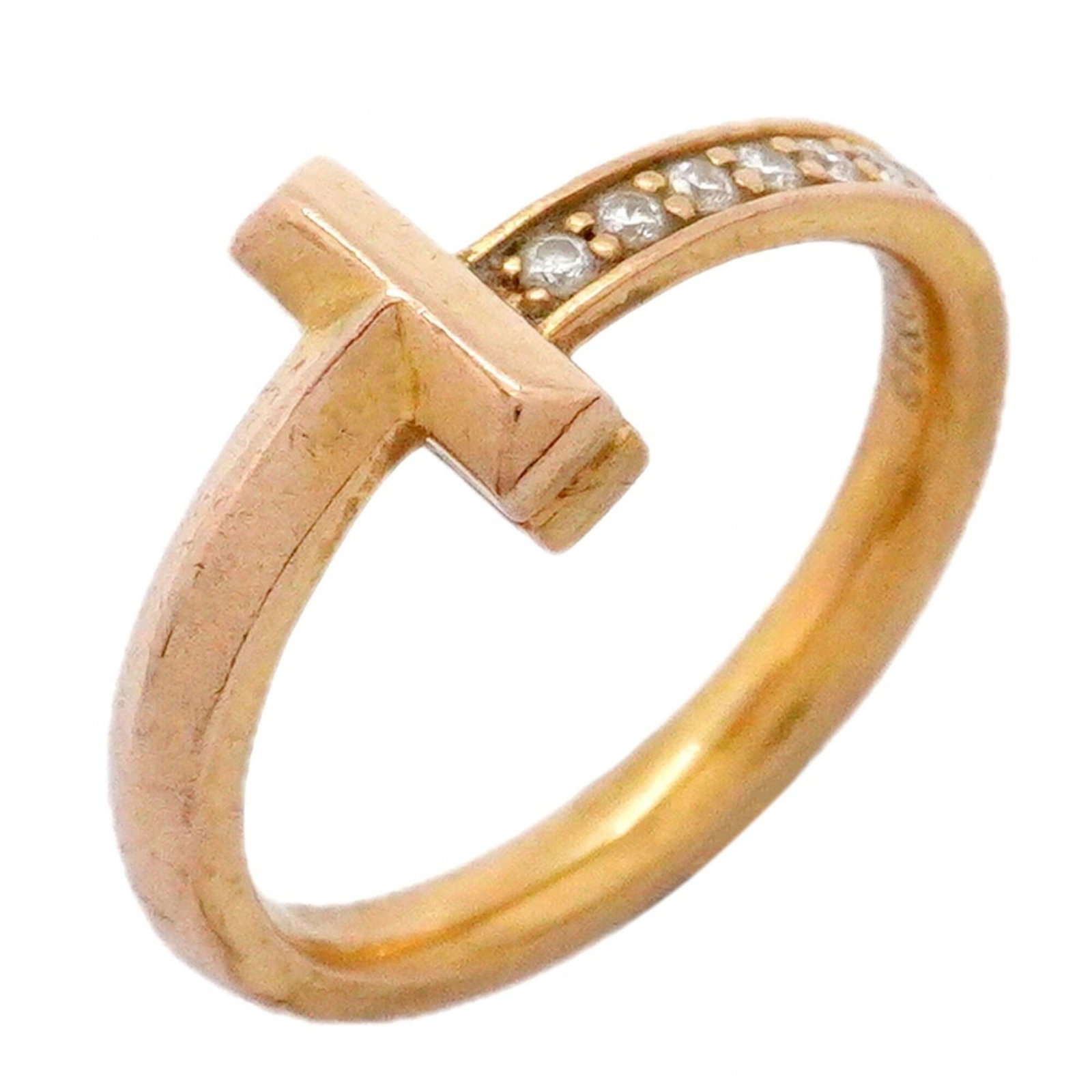Pink Gold Ring Band Tiffany: Pink Gold Ring Band Tiffany Pink Gold Ring Band Tiffany - A statement piece featuring a diamond set in an 18K pink gold band, showcasing the classic style of Tiffany. The ring has been worn and shows