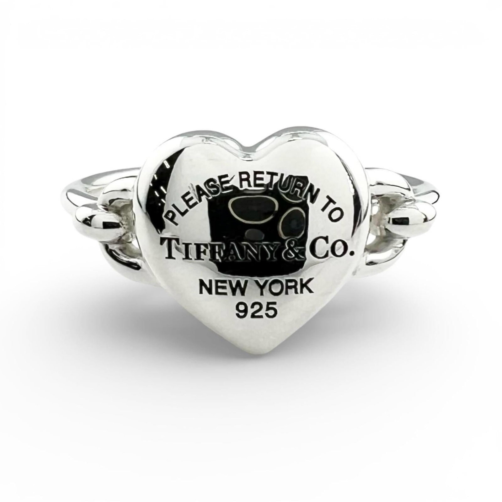 Tiffany Band Ring Silver 925: Tiffany Band Ring Silver 925 Silver band ring from Tiffany, made with 925 sterling silver, available in US size 9 and measuring 1mm in width. This ring weighs approximately 5g and bears a signature. I
