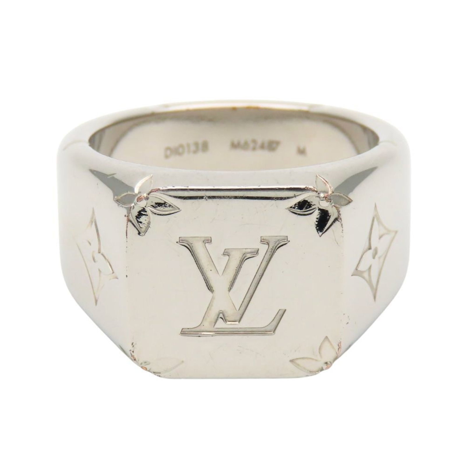 Metal ring band Louis Vuitton: Metal ring band Louis Vuitton Silver Louis Vuitton metal band ring, featuring the iconic brand's signature style. The ring bears traces of usage and minor scratches, but remains in good condition over