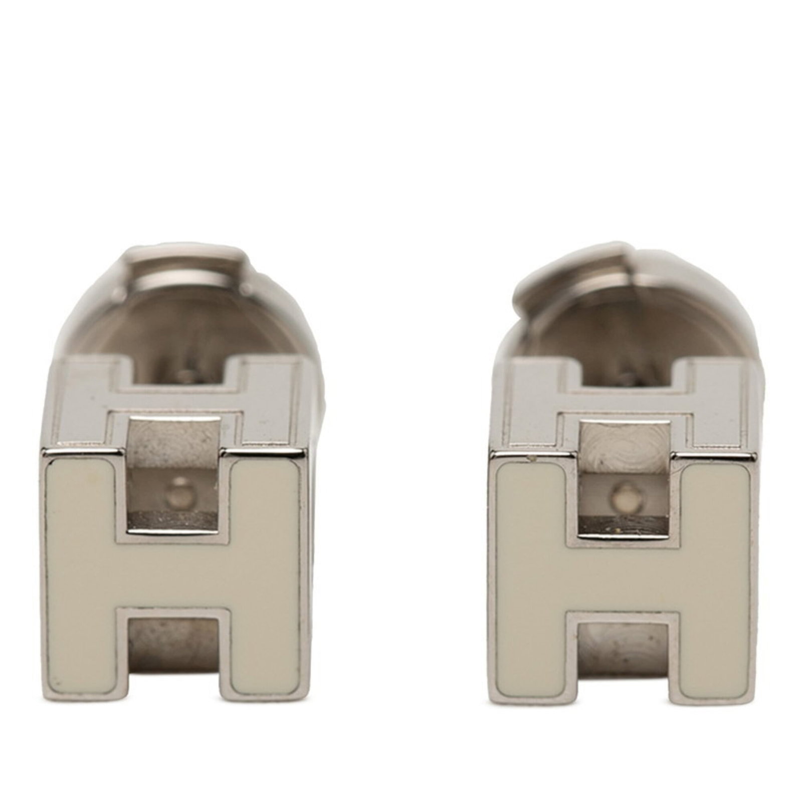 Hermes Stud Earrings Metal: Hermes Stud Earrings Metal Stud earrings from the iconic French fashion house Hermes, featuring a sleek silver metal design. The small size and understated style make them versatile for everyday wear.