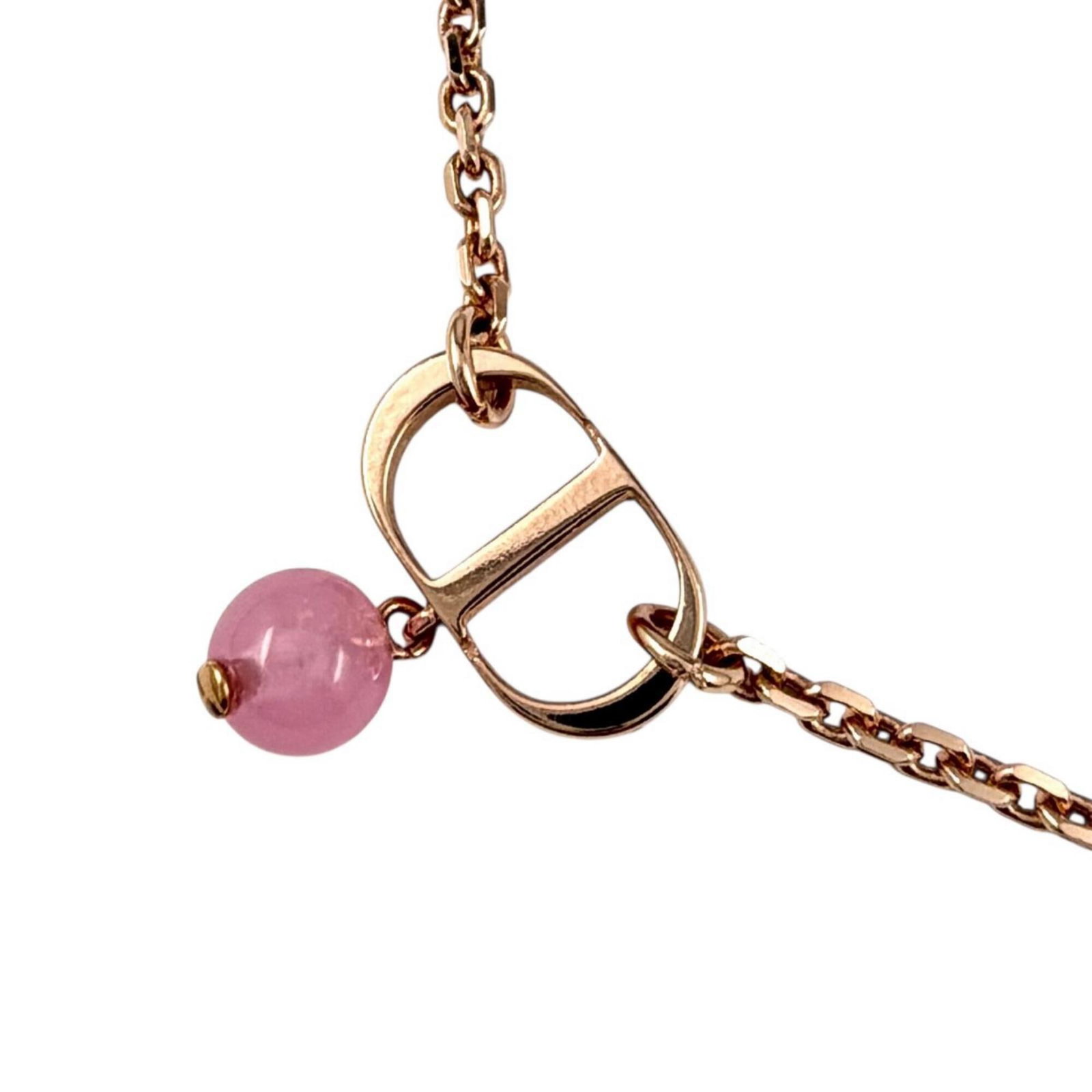 Christian Dior N1390Ptcpl Petit Cd 1P Diamond Resin Pearl Necklace Rose Gold With Box For Women: Christian Dior N1390Ptcpl Petit Cd 1P Diamond Resin Pearl Necklace Rose Gold With Box For Women Rose Gold Necklace with Diamond Resin Pearl Pendant. This Christian Dior necklace features a rose gold