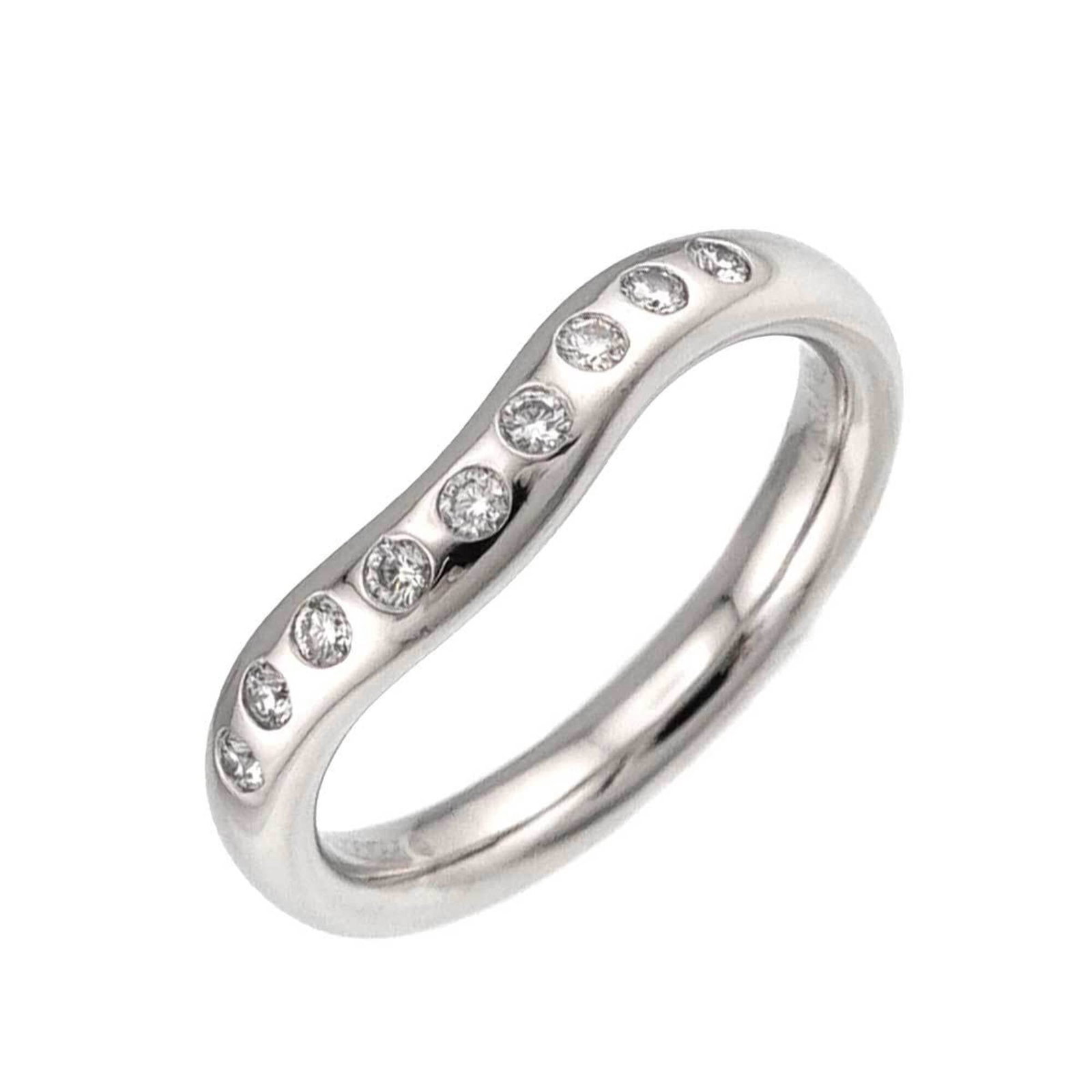 Platinum ring by Tiffany band: Platinum ring by Tiffany band Platinum ring by Tiffany & Co. features a stunning band design, crafted from high-quality platinum. This 950-plated piece boasts a sleek and sophisticated look, suitable