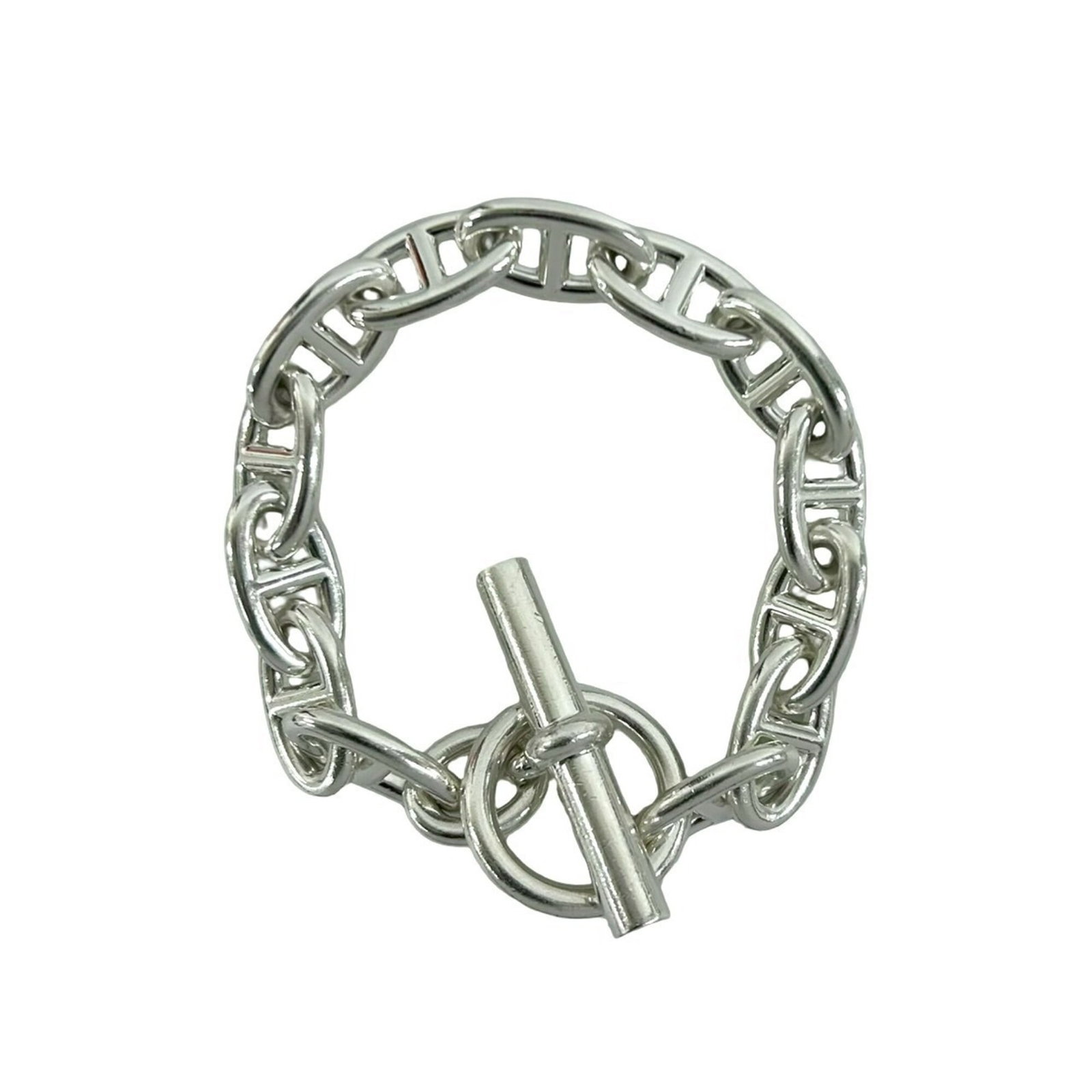 Silver Charm Bracelet 925 by Hermes: Silver Charm Bracelet 925 by Hermes Silver Charm Bracelet 925 by Hermes, featuring a classic design with subtle signs of wear from past use. This 20.5cm long charm bracelet is made from high-quality s
