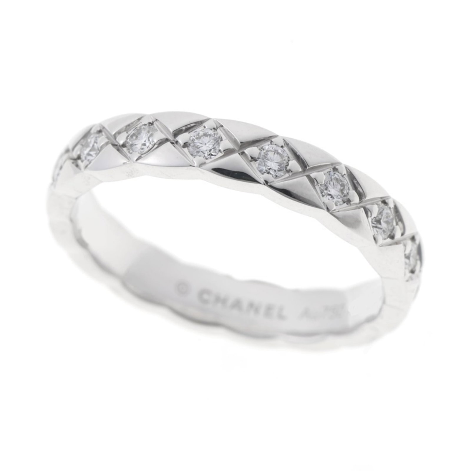 White Gold Chanel Ring Band 18K: White Gold Chanel Ring Band 18K 18K White Gold Chanel Ring Band in excellent condition, featuring a luxurious white gold band with a subtle elegance. This high-quality ring band bears a signature and 