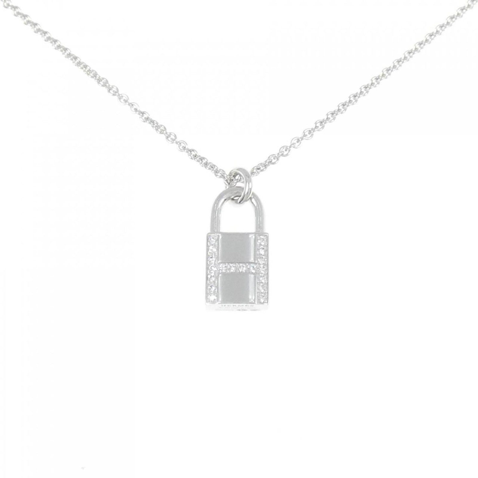 Amulet Padlock Necklace of Hermes: Amulet Padlock Necklace of Hermes White gold (18K) necklace with an Amulet Padlock pendant, measuring 16.4mm x 8.2mm, set in a sturdy chain suitable for a 38-40 cm neck circumference. This used item h