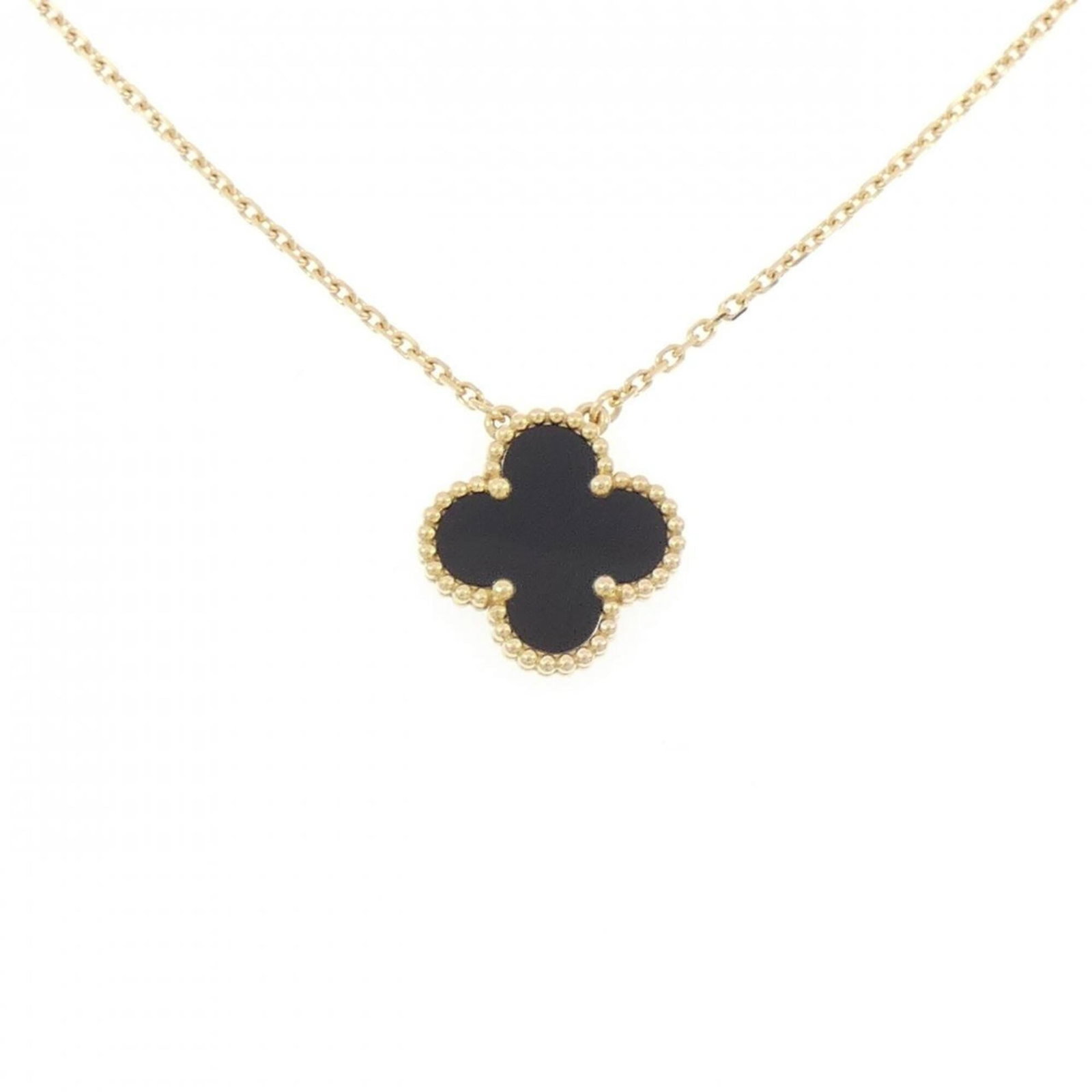 Vintage Alhambra Van Cleef Necklace: Vintage Alhambra Van Cleef Necklace Yellow gold (18K) pendant necklace featuring an onyx stone, crafted by Van Cleef & Arpels. The Alhambra design showcases intricate details and ornate patterns, addi