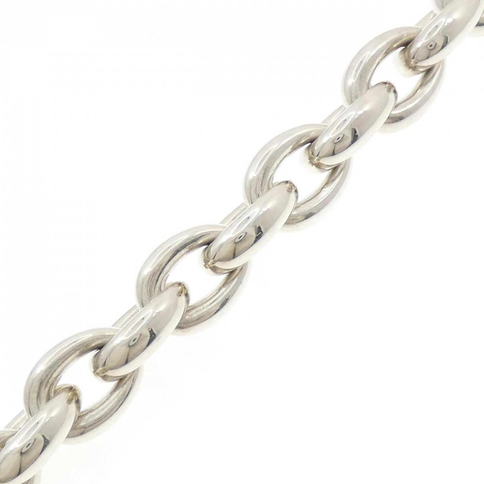 Silver Charm Bracelet 925 by Hermes: Silver Charm Bracelet 925 by Hermes Silver Charm Bracelet 925 by Hermes - A stylish and elegant accessory, this 22cm charm bracelet features a silver 925 material, bearing the iconic brand mark. With 