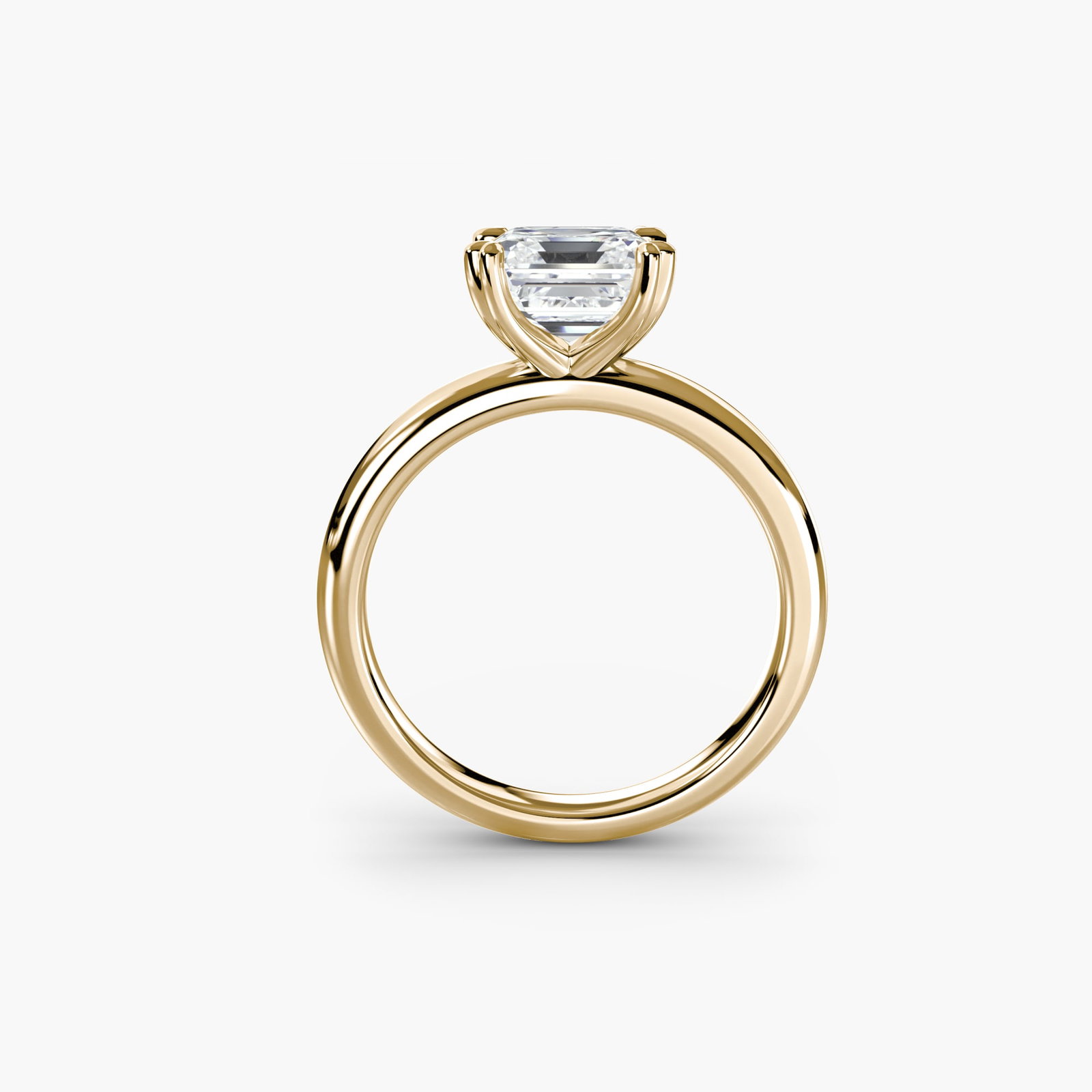 Solitaire Asscher 18Kt Yellow Gold Ring Setting: Solitaire Asscher 18Kt Yellow Gold Ring Setting The Solitaire Asscher 18Kt Yellow Gold Ring Setting boasts a sleek, modern design with a slender 2.4mm band width. This exquisite setting features an