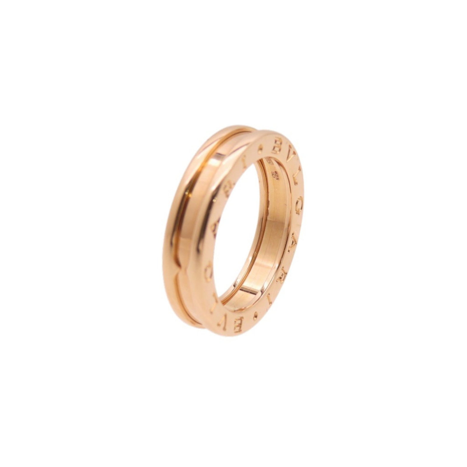 Pink Gold 18K Bvlgari Band Ring: Pink Gold 18K Bvlgari Band Ring Pink Gold 18K Bvlgari Band Ring - A luxurious pink gold band ring from the renowned Italian luxury brand, featuring 18k metal purity and a sleek design. This mint
