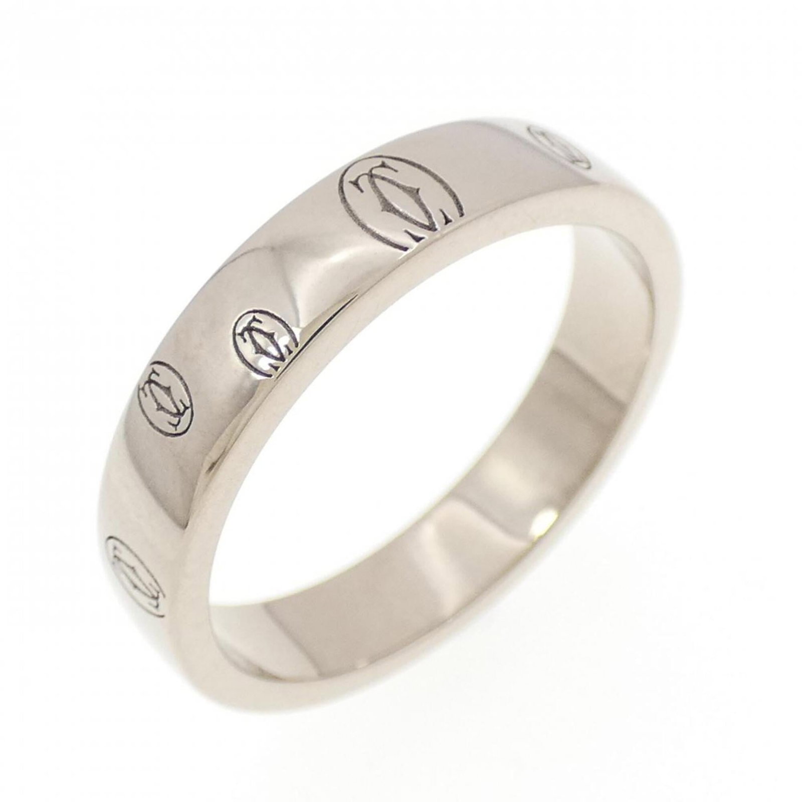 White Gold Cartier Band Ring 18K: White Gold Cartier Band Ring 18K White Gold Cartier Band Ring 18K features an 18-karat white gold band, bearing the iconic Cartier brand. This used ring is in very good condition, with some traces of 
