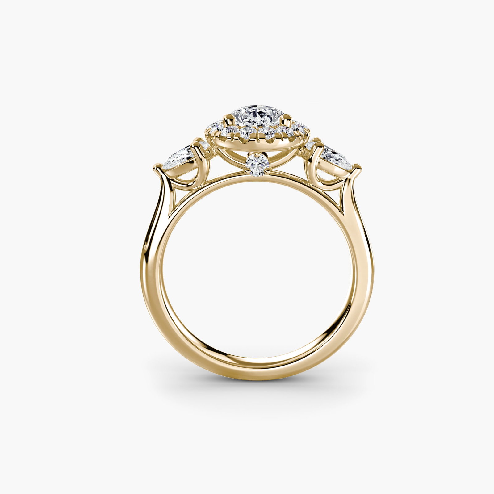 Halo Pear 18Kt Yellow Gold Ring Setting: Halo Pear 18Kt Yellow Gold Ring Setting Pear-shaped ring setting in 18Kt yellow gold, featuring 21 side stones totaling 0.517 carats. The setting's clean lines and elegant design make it a versatile
