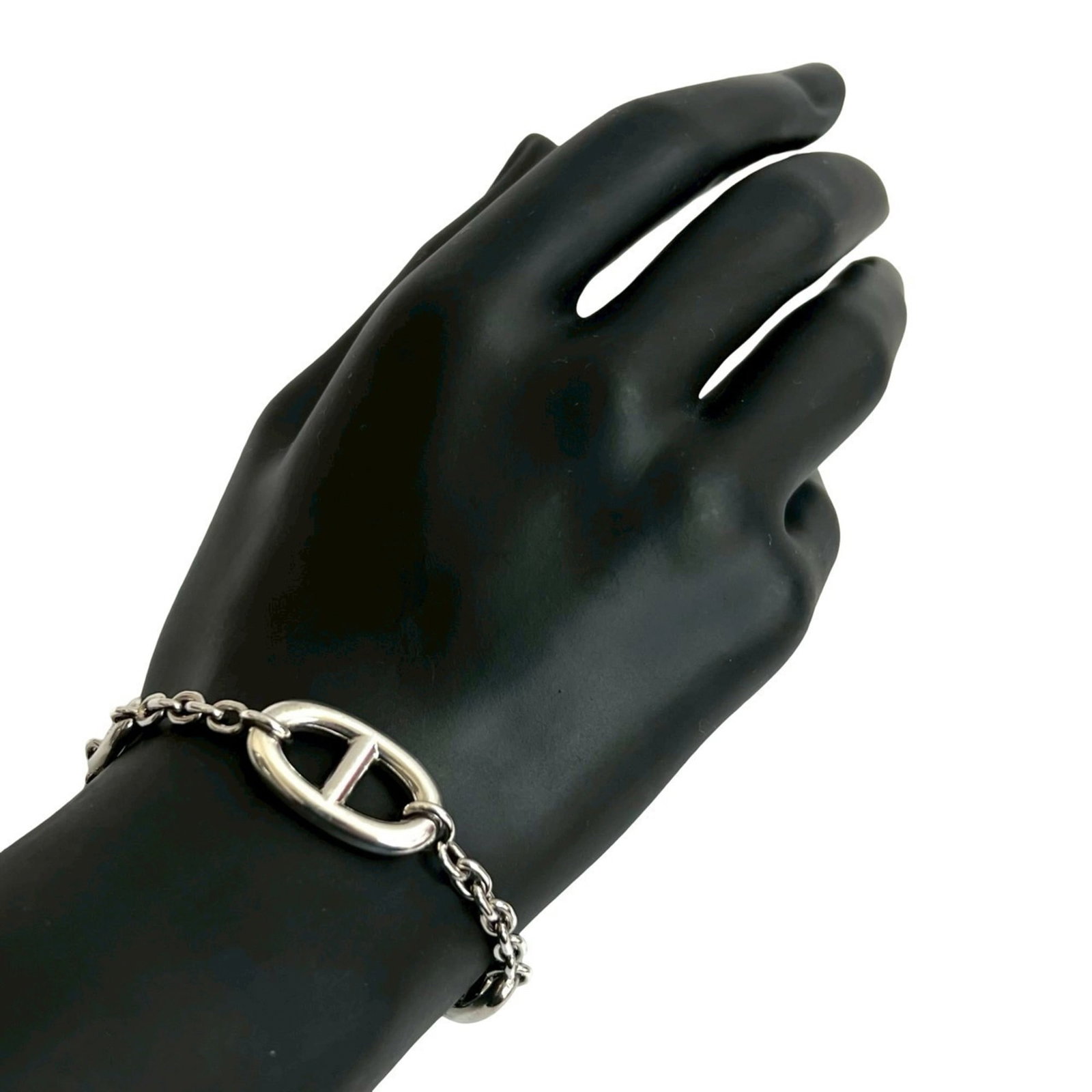 Silver Charm Bracelet 925 by Hermes: Silver Charm Bracelet 925 by Hermes Silver Charm Bracelet 925 by Hermes. This 16.5cm silver charm bracelet features the iconic Hermes brand and is made from high-quality sterling silver (925). With tr