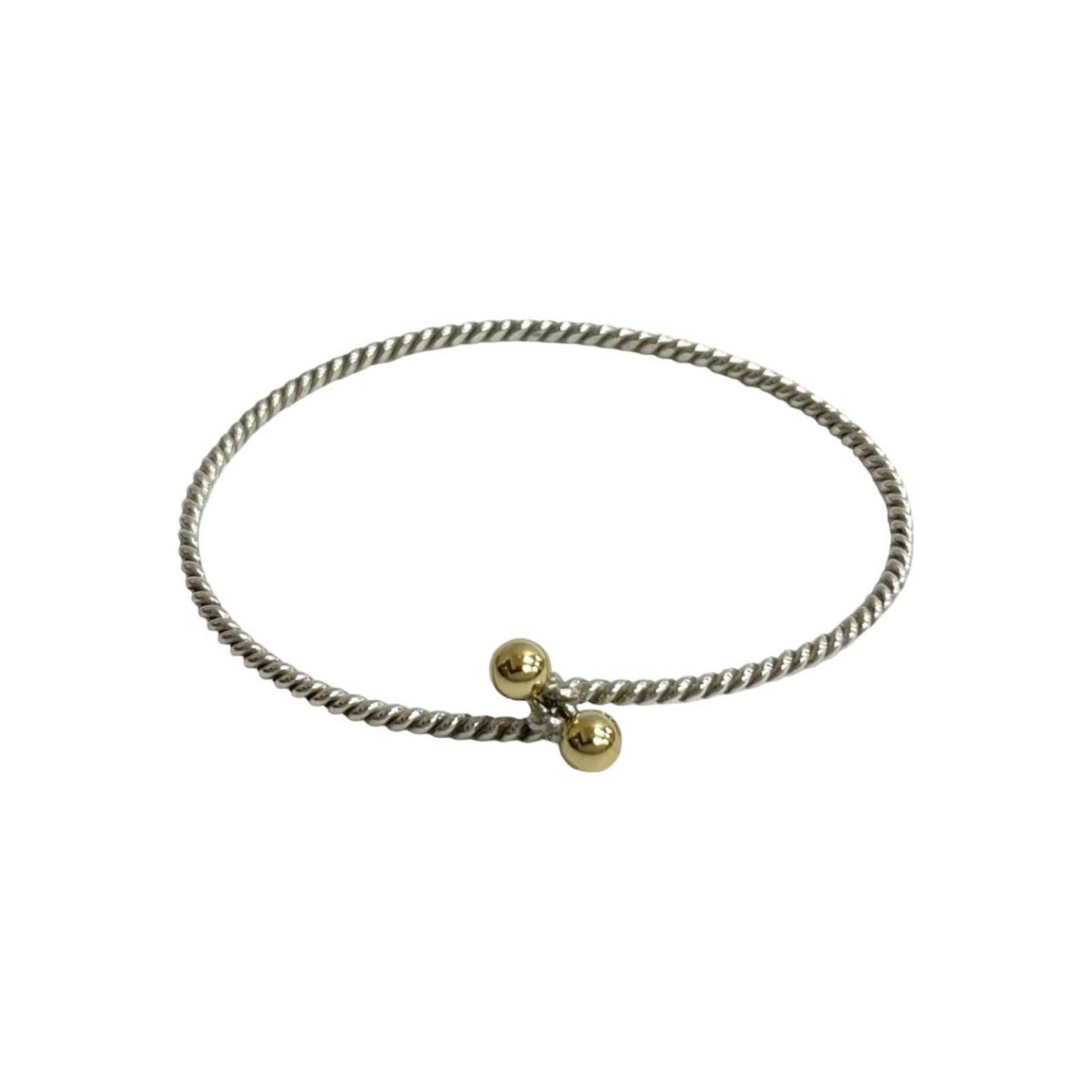 Tiffany charm bracelet gold 18K silver 925: Tiffany charm bracelet gold 18K silver 925 Gold 18K and Silver 925 combine in this Tiffany charm bracelet, offering a unique blend of luxury materials. The 17cm length provides a comfortable fit, whil