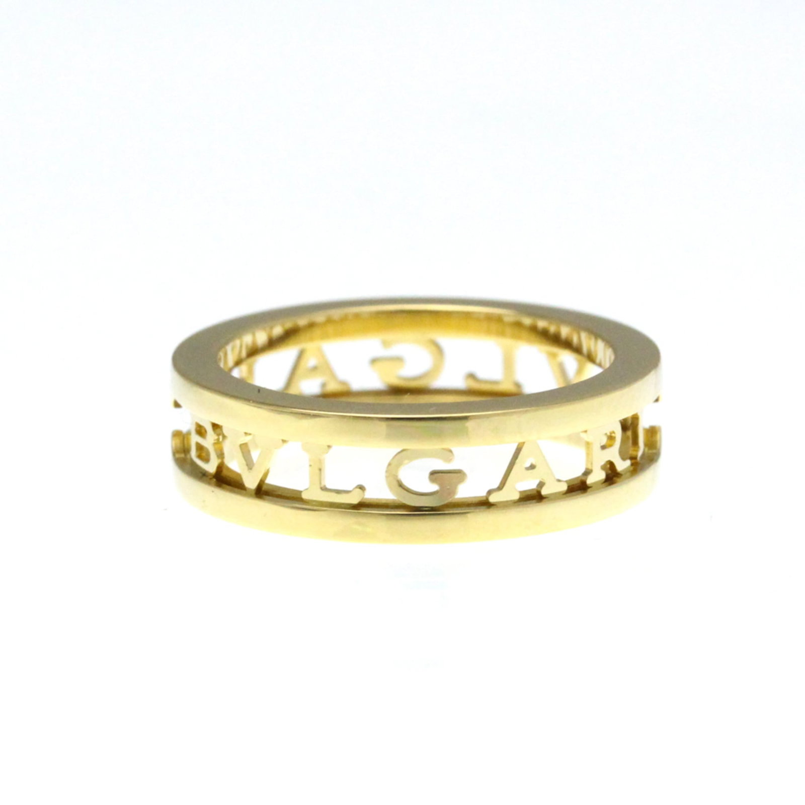 Bvlgari Band Ring Yellow Gold (18K): Bvlgari Band Ring Yellow Gold (18K) Bvlgari Band Ring Yellow Gold (18K) - A sleek and sophisticated accessory from the renowned Italian luxury brand. This 18K yellow gold band ring boasts a classic