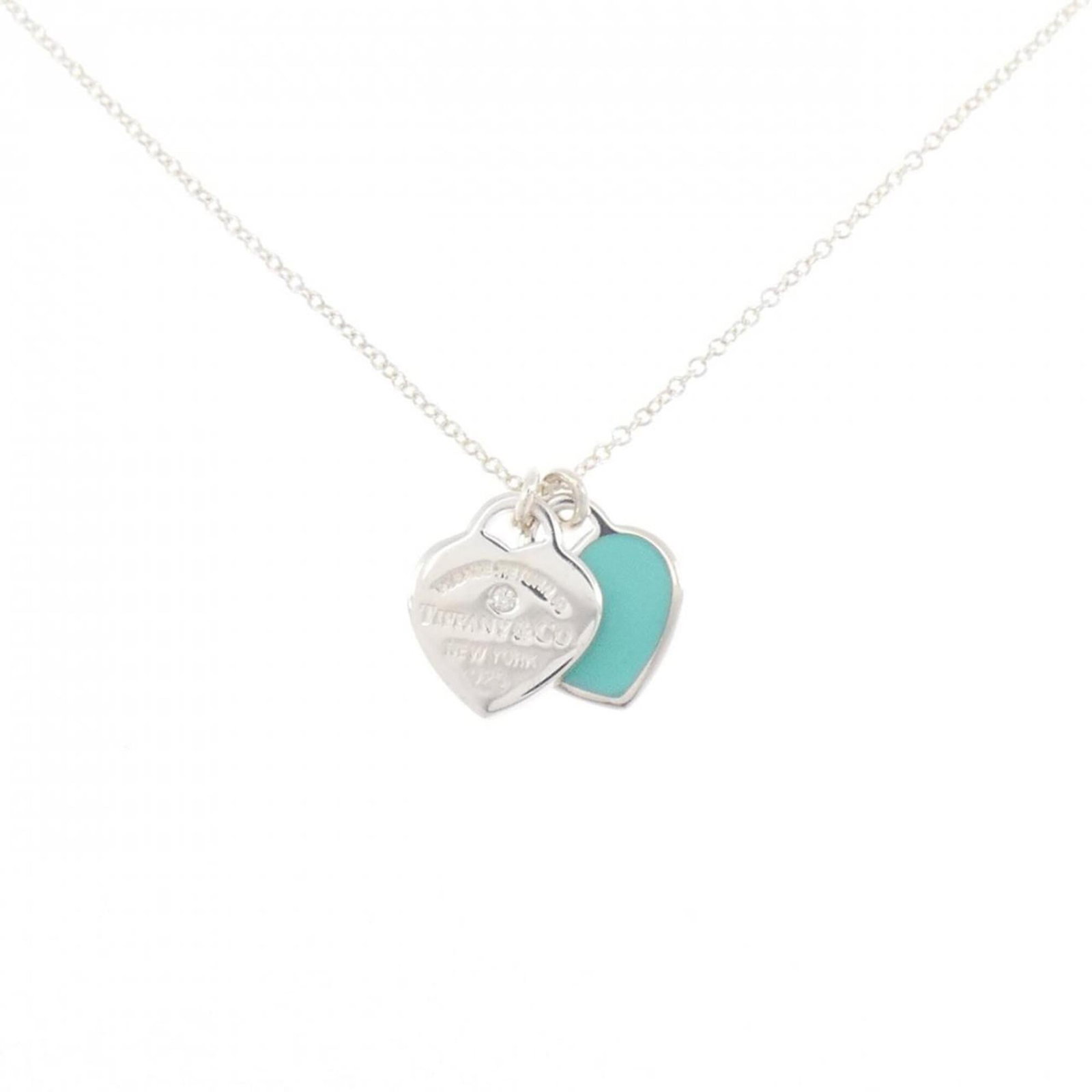 Return To Tiffany Necklace: Return To Tiffany Necklace Return To Tiffany Necklace, a timeless piece featuring a diamond pendant set in sterling silver. Measuring 13.3mm x 13mm, the necklace boasts a classic design with a 40 cm