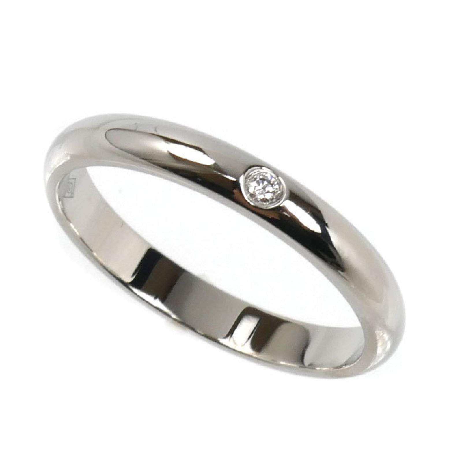 Ring Band by Platinum 950: Ring Band by Platinum 950 Platinum 950 band ring by Cartier, featuring a diamond stone. This women's band ring showcases the luxury of platinum 950 material and the sparkle of its accompanying